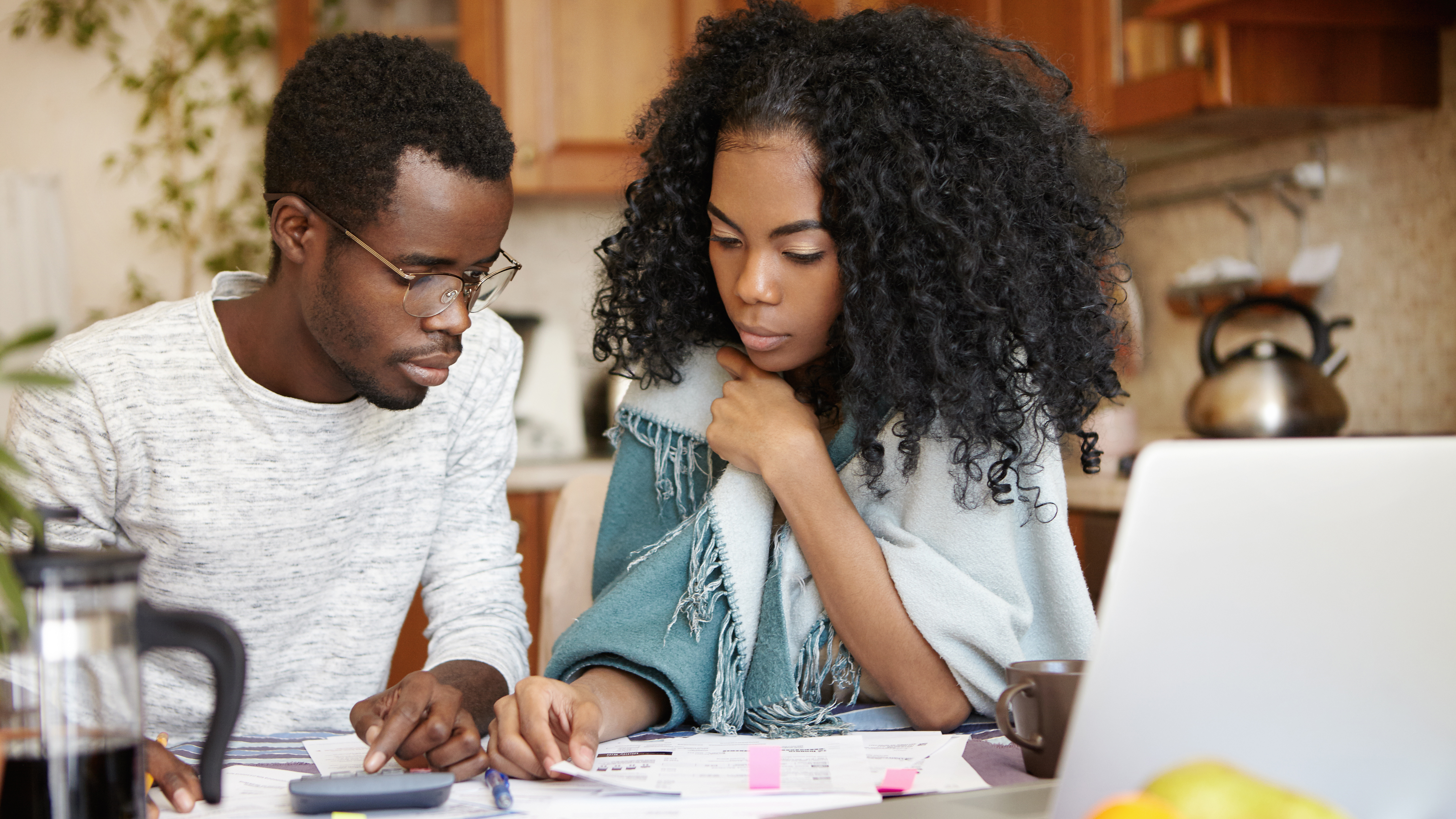 A couple doing paperwork together