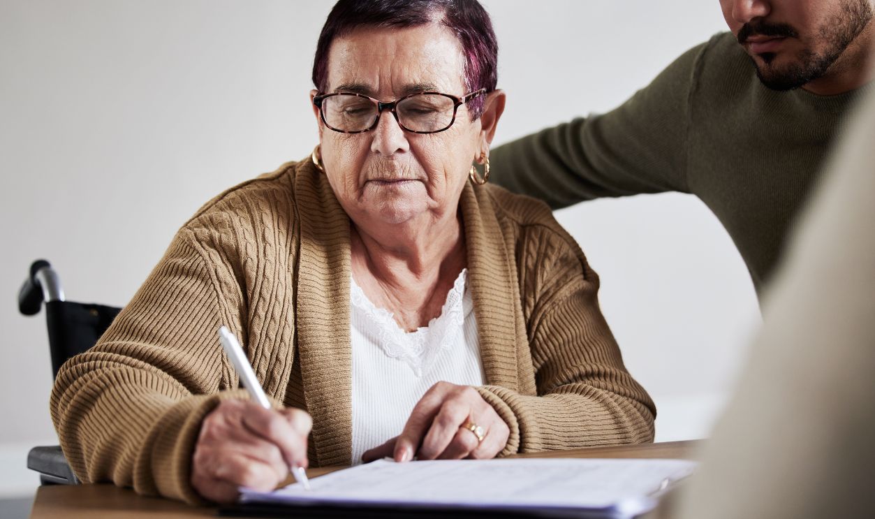 Legal, signature and contract with senior woman planning on documents for partnership, b2b and agreement. Lawyer, financial advisor and consulting with man and mother for retirement deal review sign