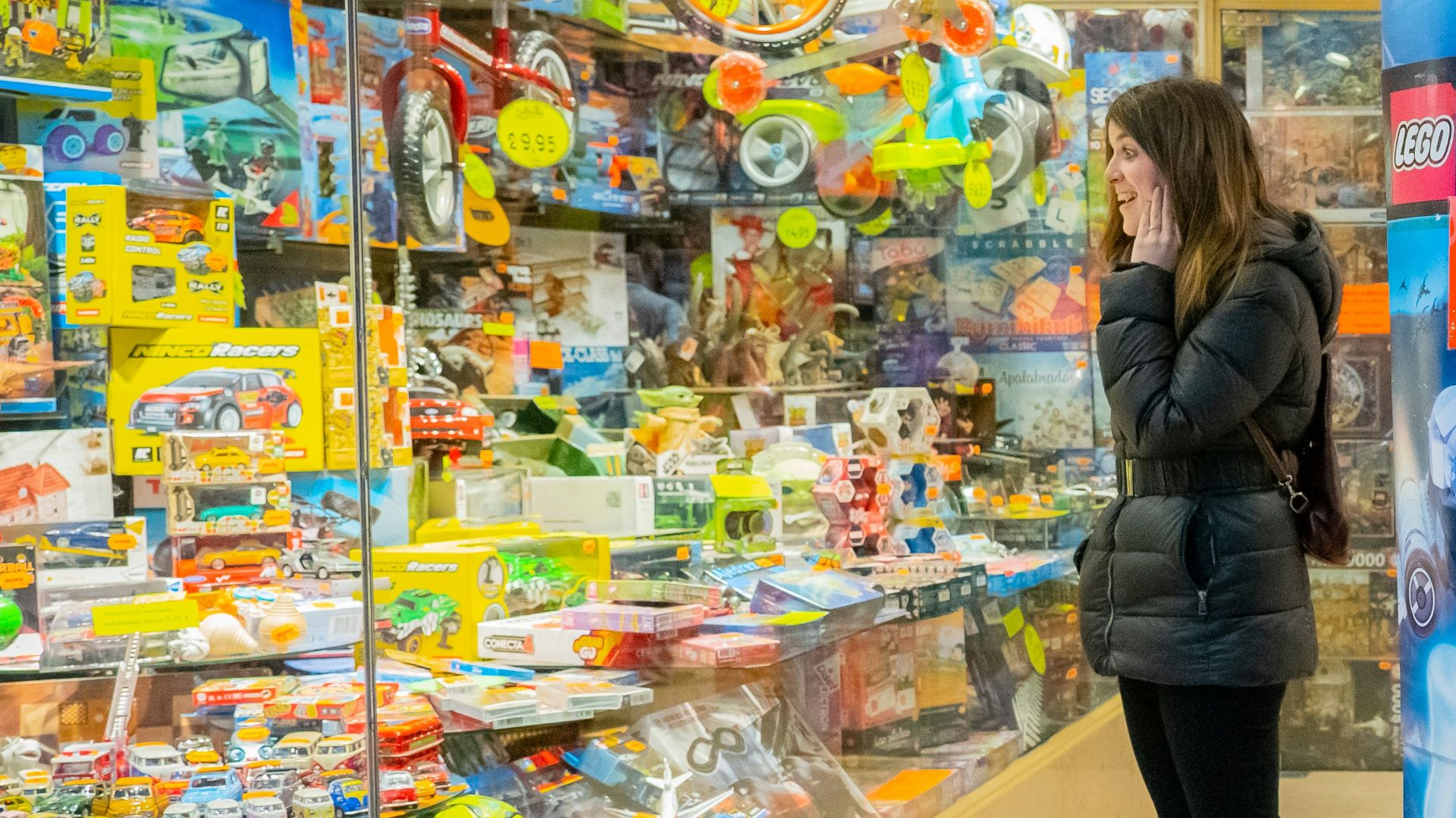 a couple of people that are standing in a store