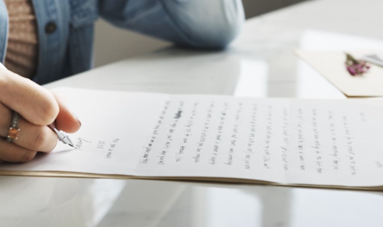 Girl Writing Letter Home Concept