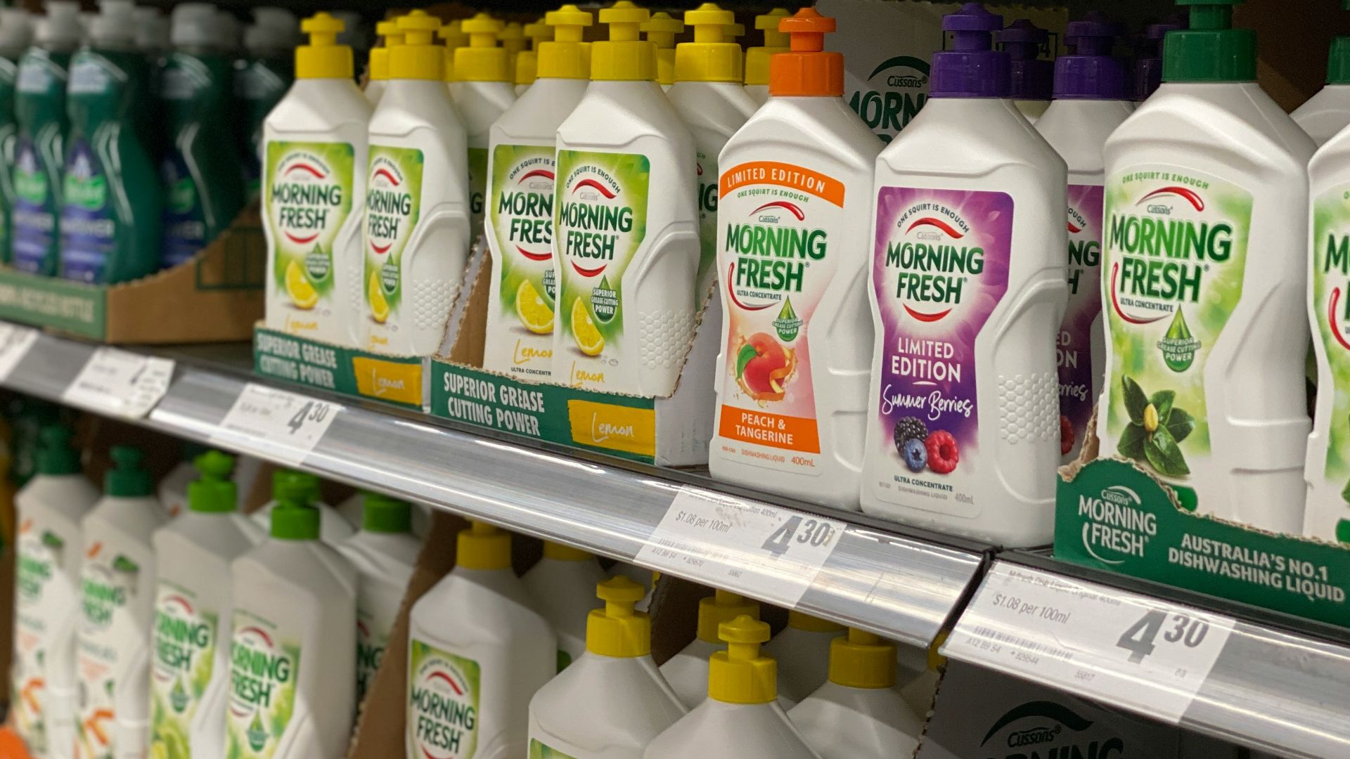 a display in a store filled with lots of bottles of cleaning products