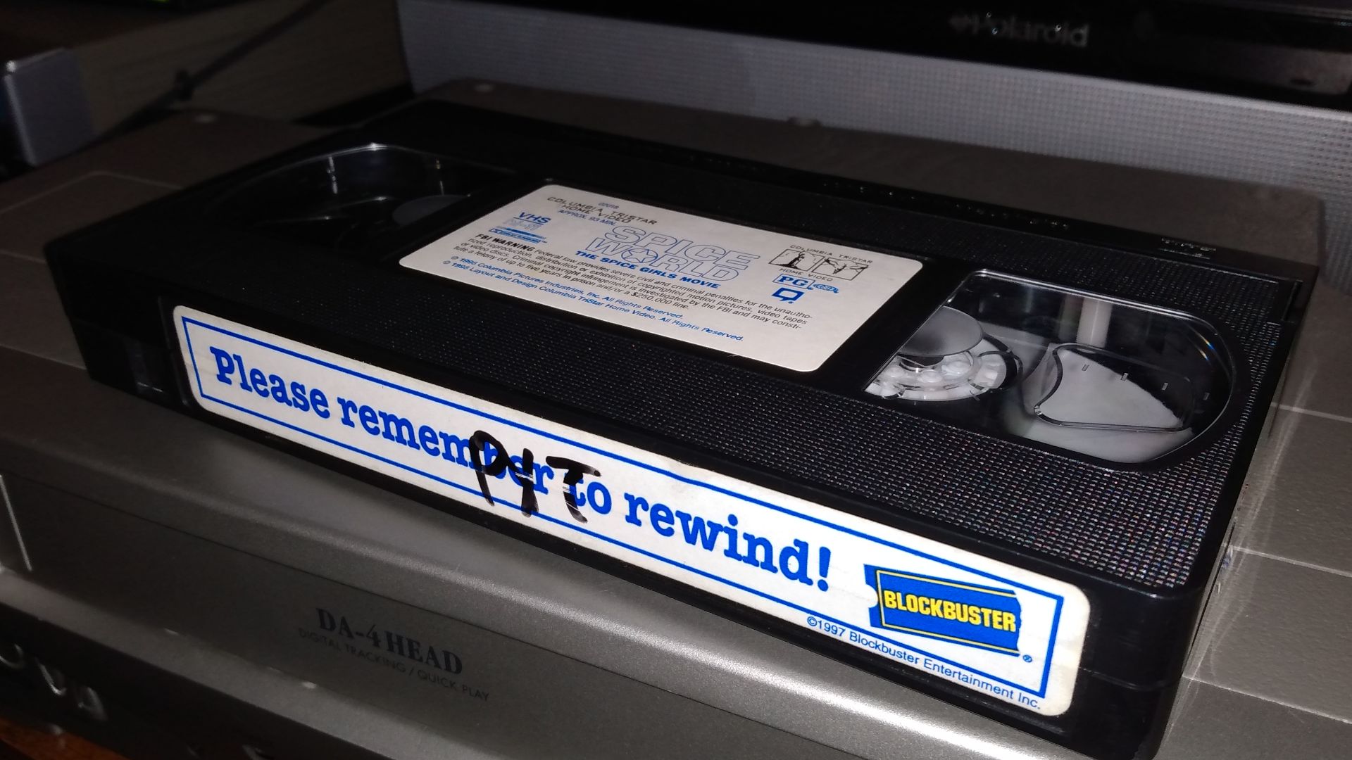 A Spice Girls Video Cassette with Blockbuster markings.