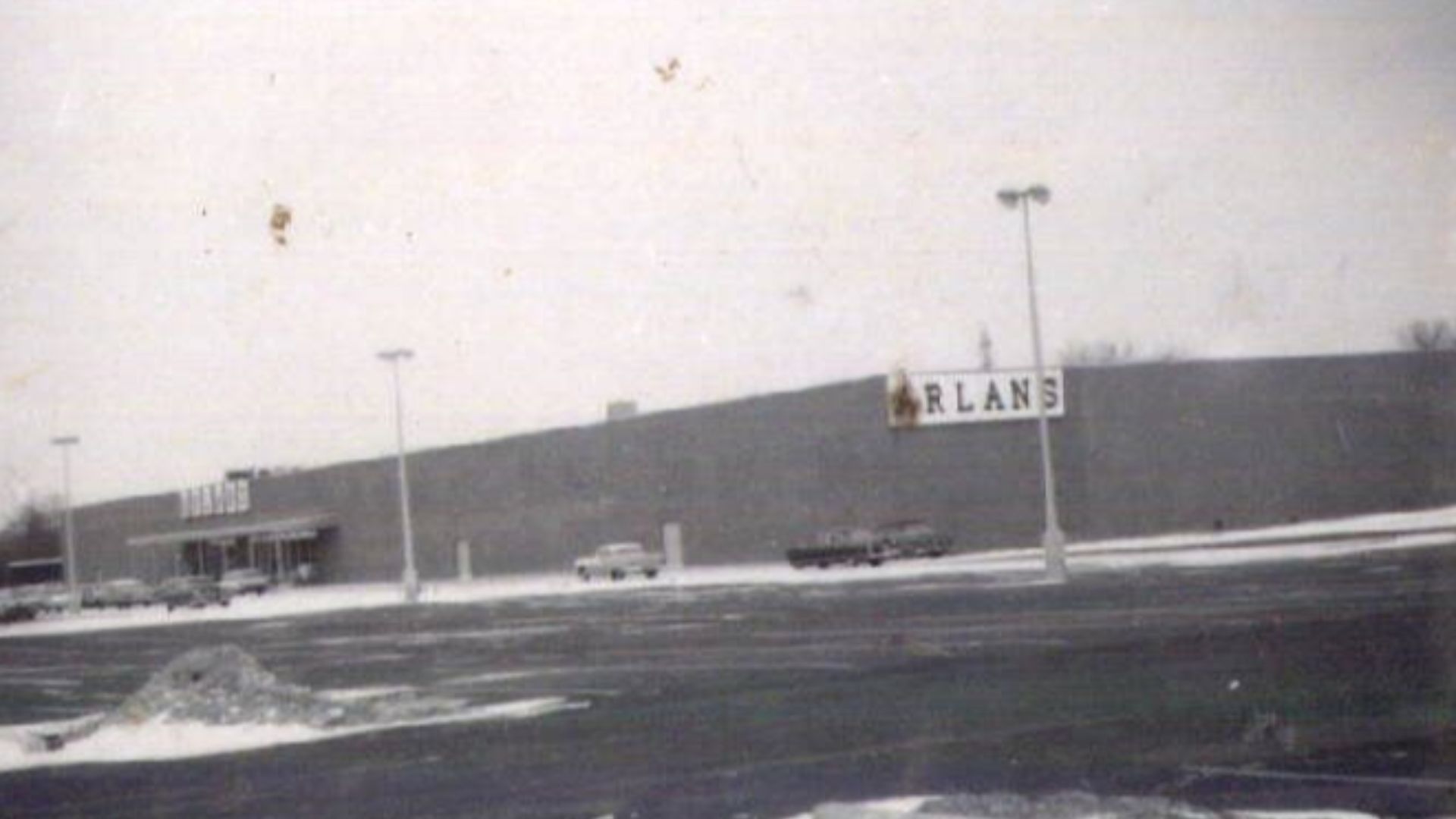 This image was produced by the Auditor's Office in Lucas County, Ohio for tax assessment purposes. Associated dates are approximate. Descriptive terms related to this photograph include: Arlan's Discount Department Store | post-modern | one story | commer