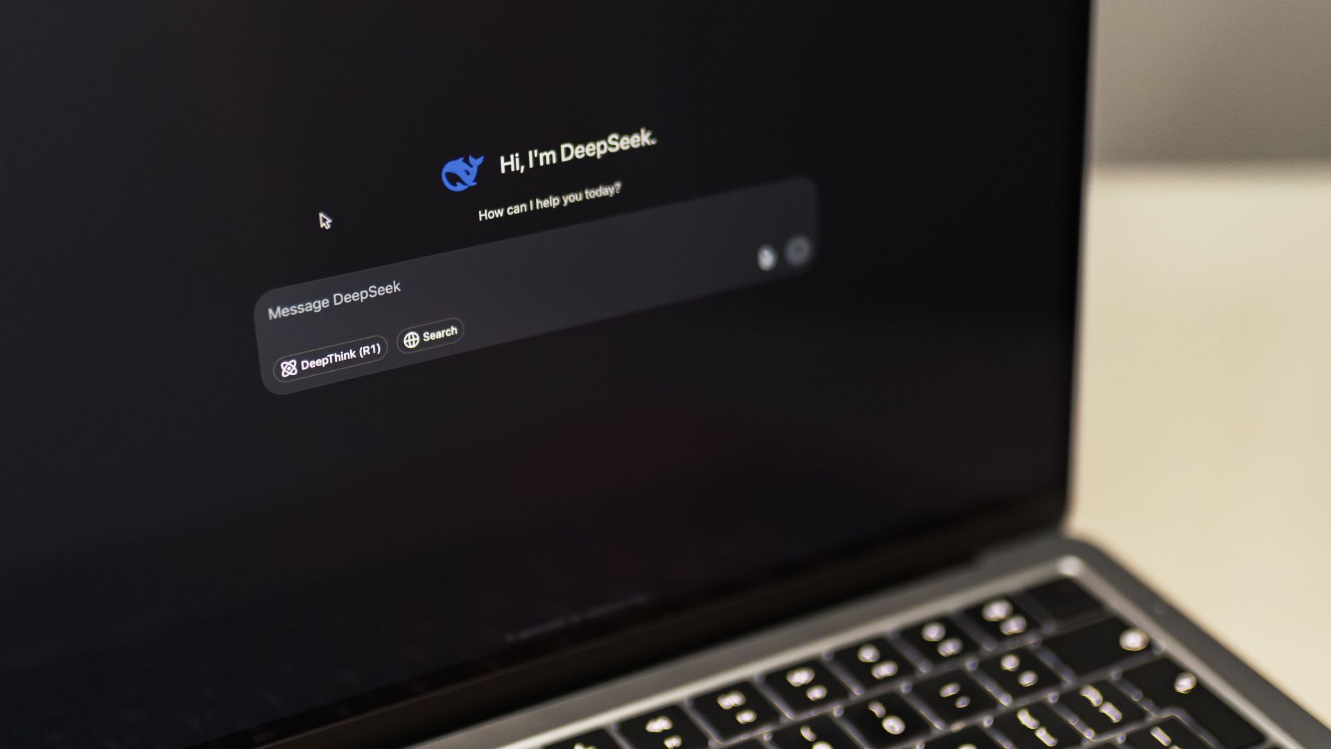 A MacBook displaying the DeepSeek AI interface, showcasing digital innovation.