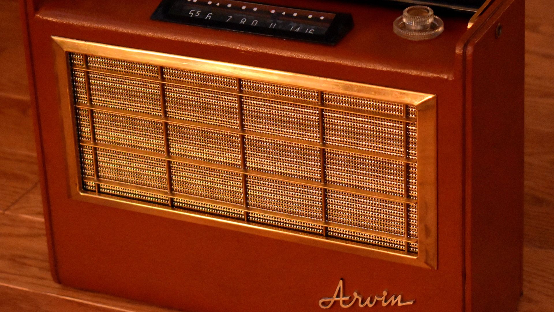 This radio has a flip-switch dial that reverses figures when used flat as a table model.