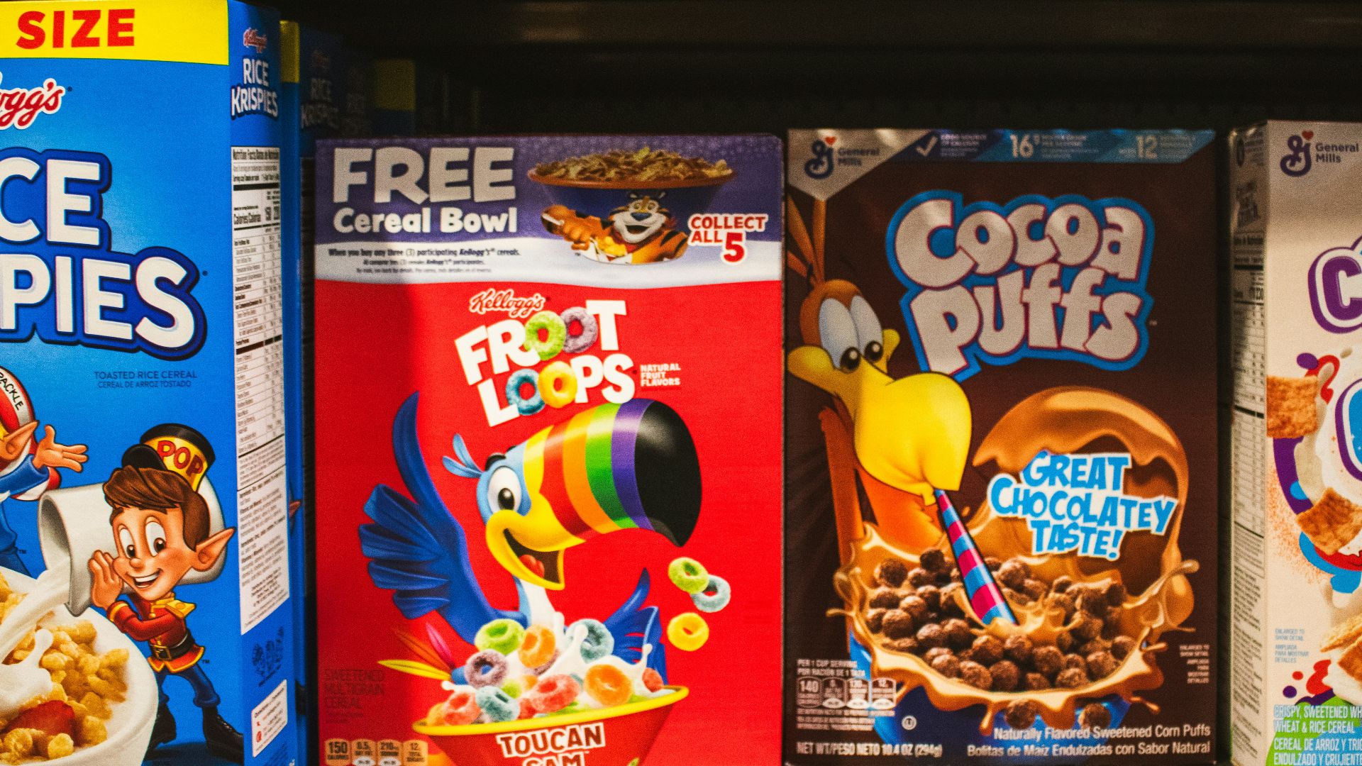 Cereal boxes displayed on a supermarket shelf