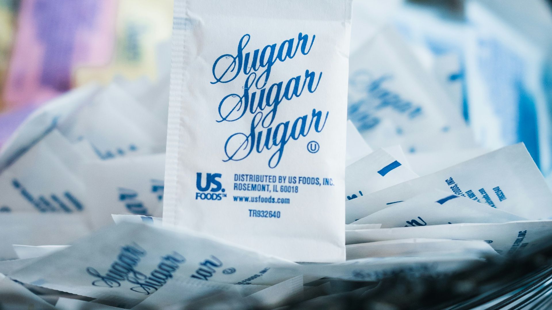 white and blue plastic pack on white paper