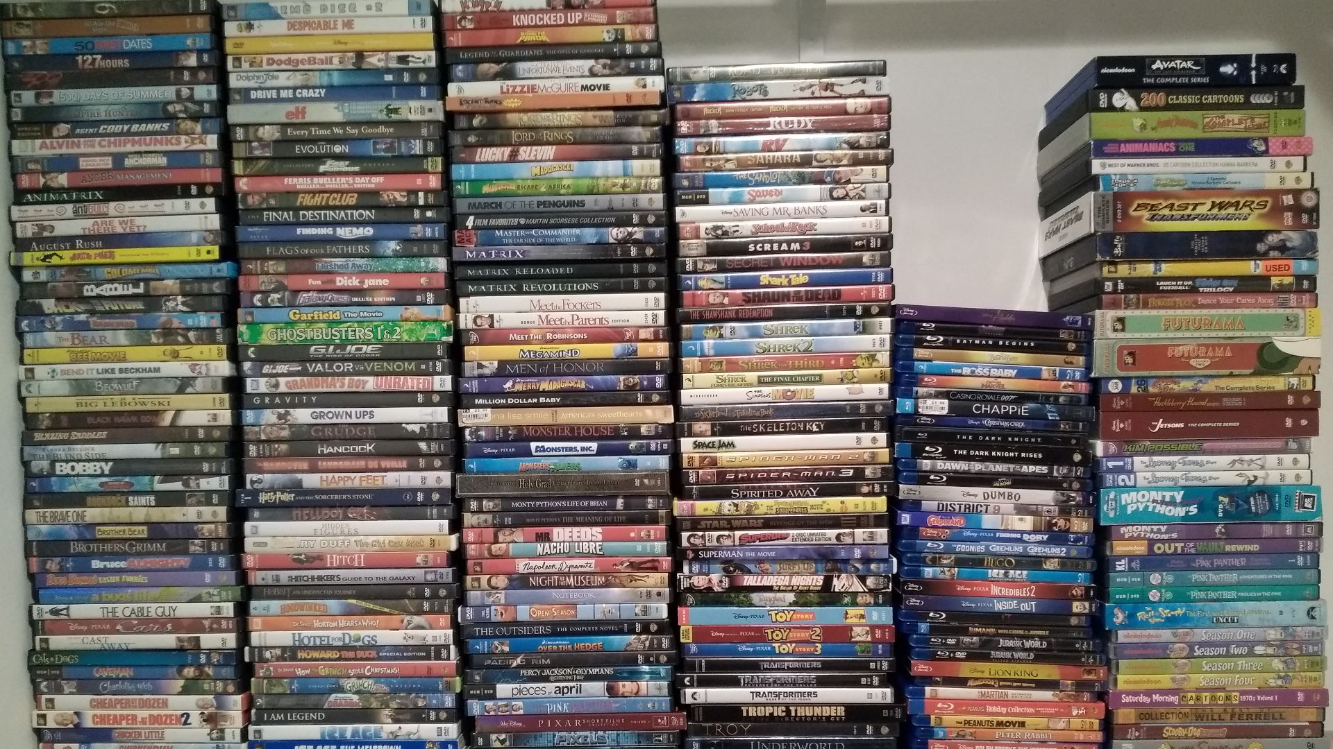 A collection of DVDs and Blu-rays