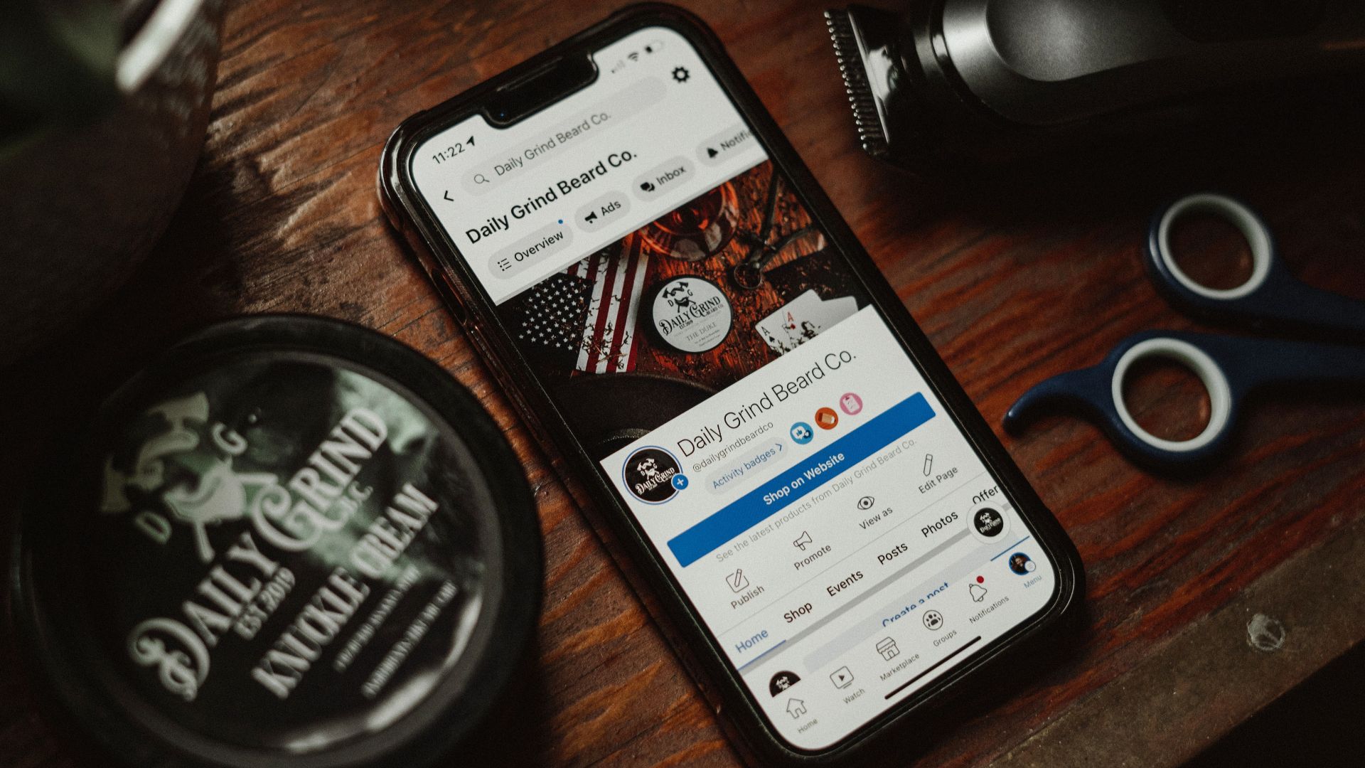 Men's grooming essentials including smartphone and beard care tools in Portland, OR.