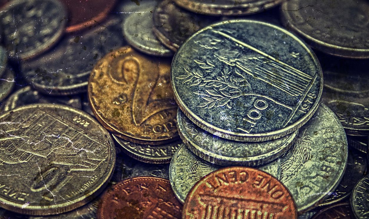 Old coins of different Nationalities, from different periods. Image digitally manipulated as one old photo.