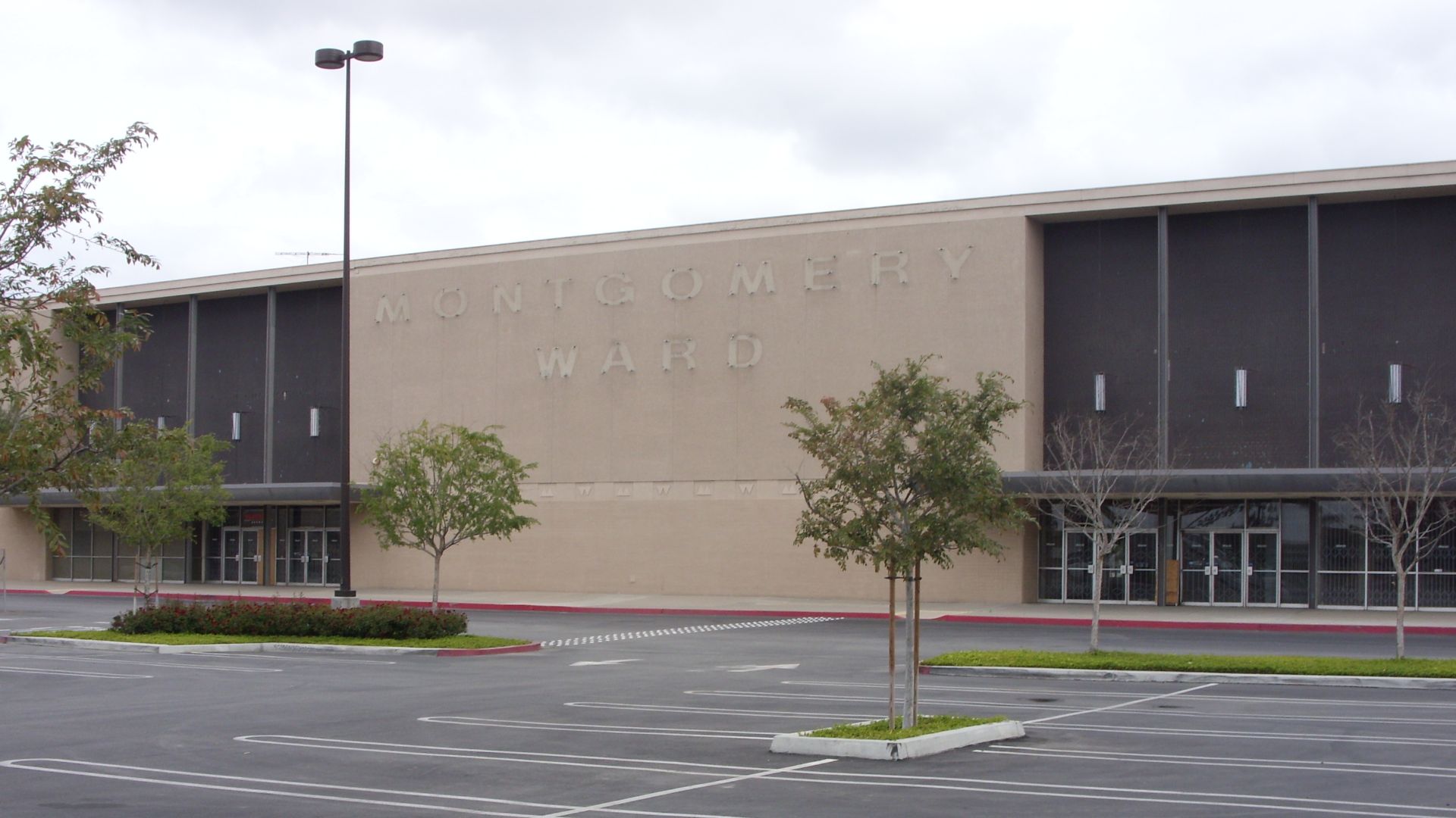 Vacant Montgomery Ward Store at Bella Terra mall in Huntington Beach, CA left standing during the demolition of the enclosed Huntington Center. The store opened in 1966 as an anchor tenant to the former Huntington Center and closed in 2001 along with the