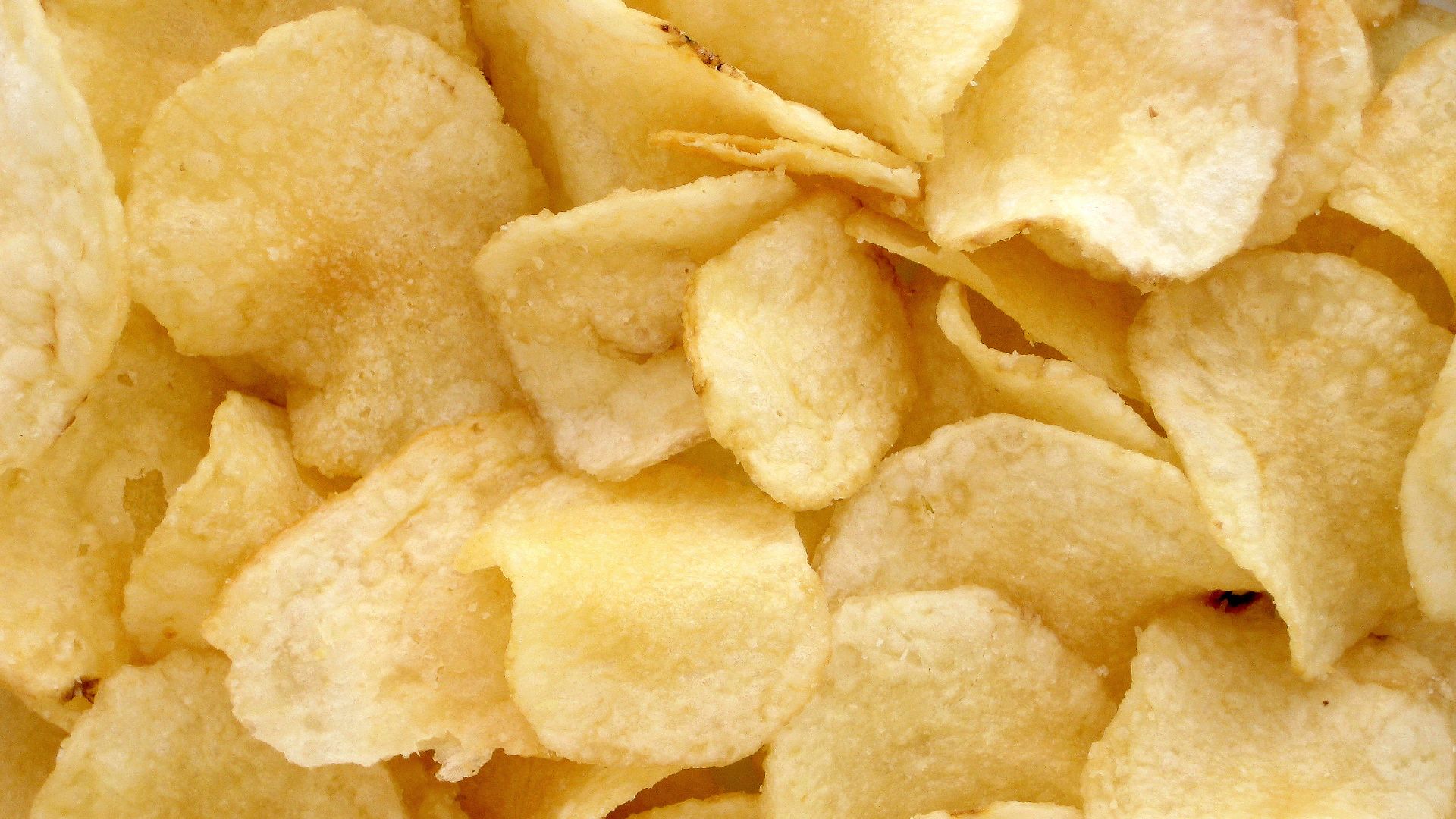 A pile of potato chips. These are Utz-brand, grandma's kettle-cooked style.