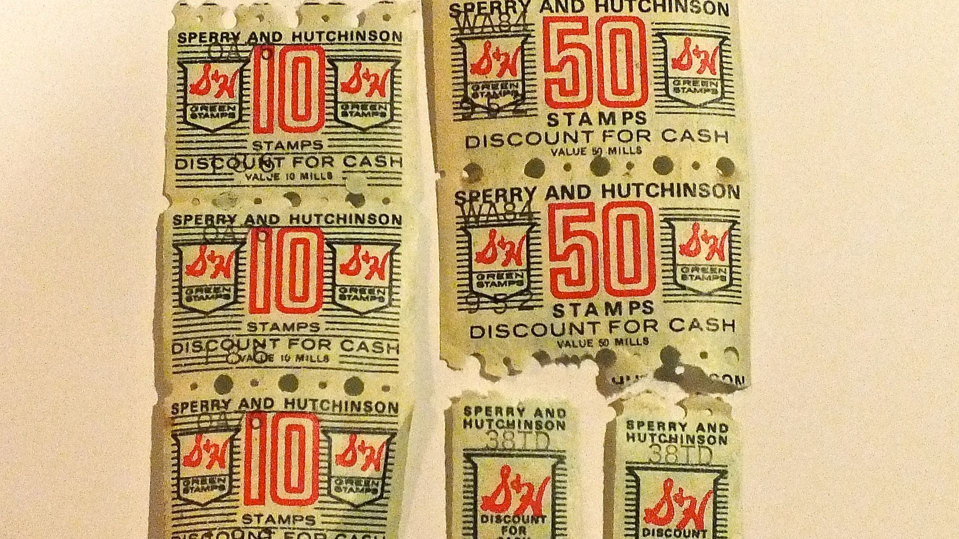 S&H Green Stamps of three different denominations and sizes