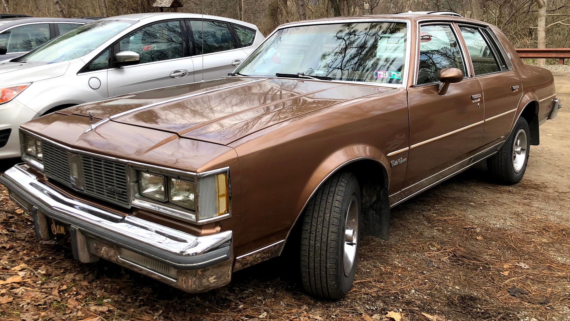 A 1985 Oldsmobile Cutlass Supreme sedan (base model), photographed in Mt. Lebanon, Pennsylvania. This Cutlass Supreme is equipped with the 3.8L V6 engine, and assembled in Arlington, Texas. I love this generation, especially the sedan, and this example se
