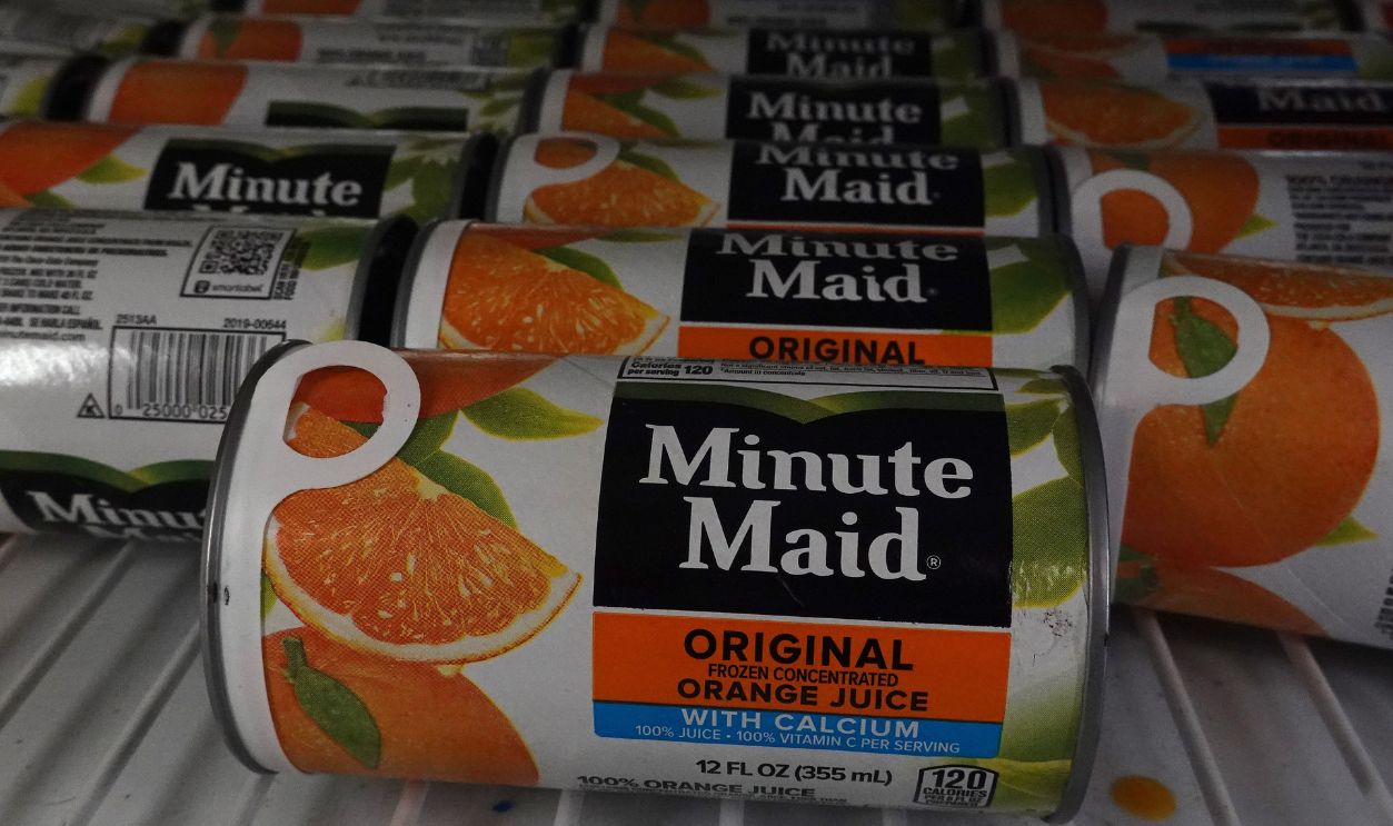 Getty Images - 2260083315 - Cans of Minute Maid frozen orange juice are displayed on a store shelf.