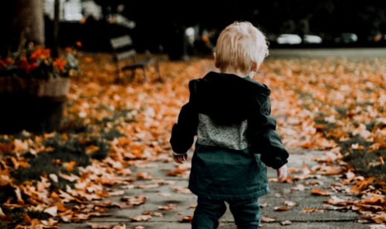 kid walking at the park