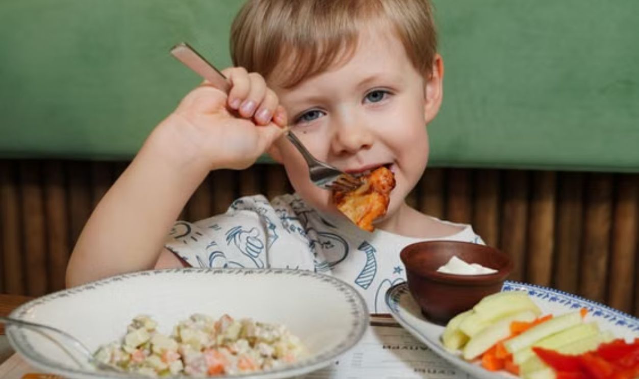 kid eating at a restaurant