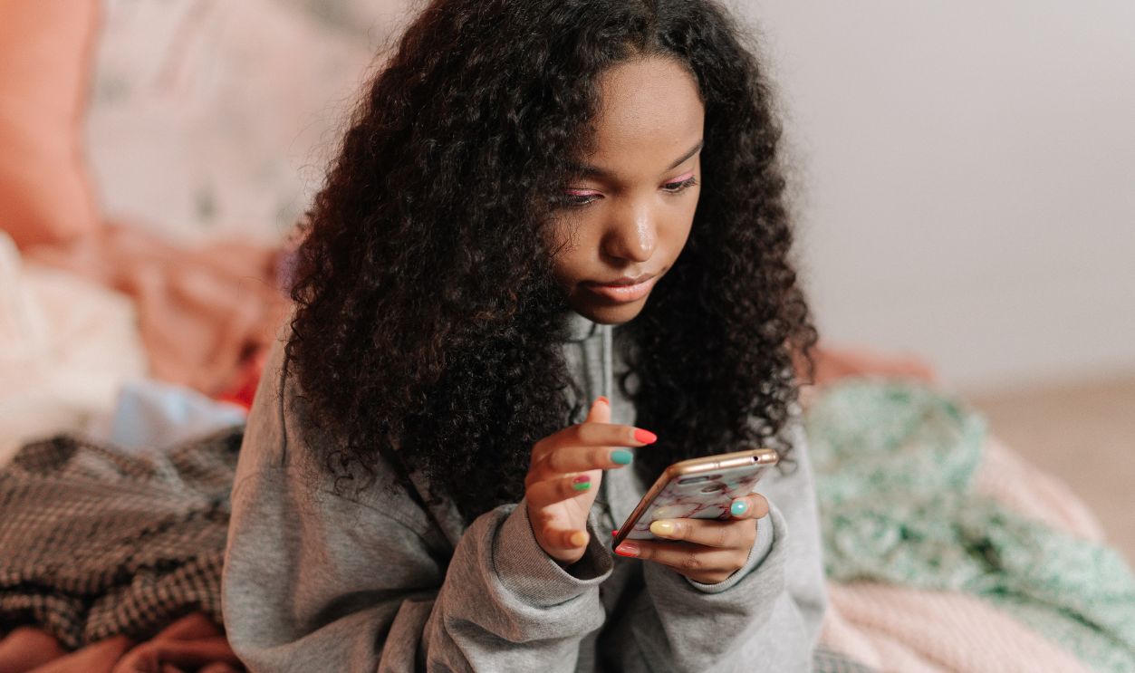 teen using phone