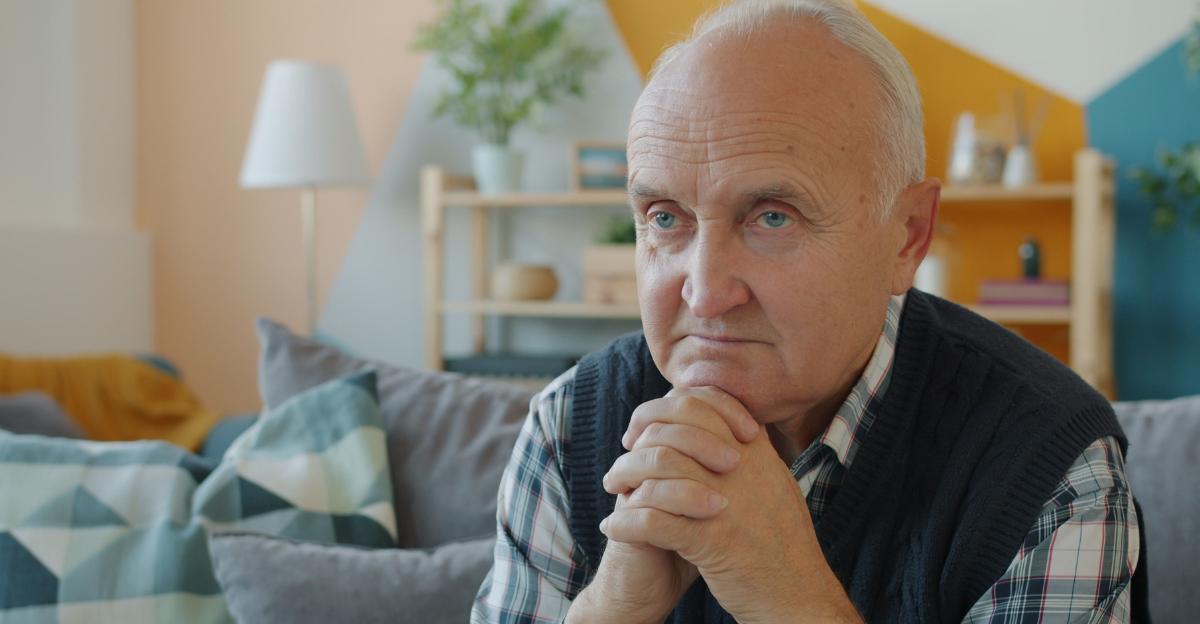 pensive-senior-man-relaxing-at-home
