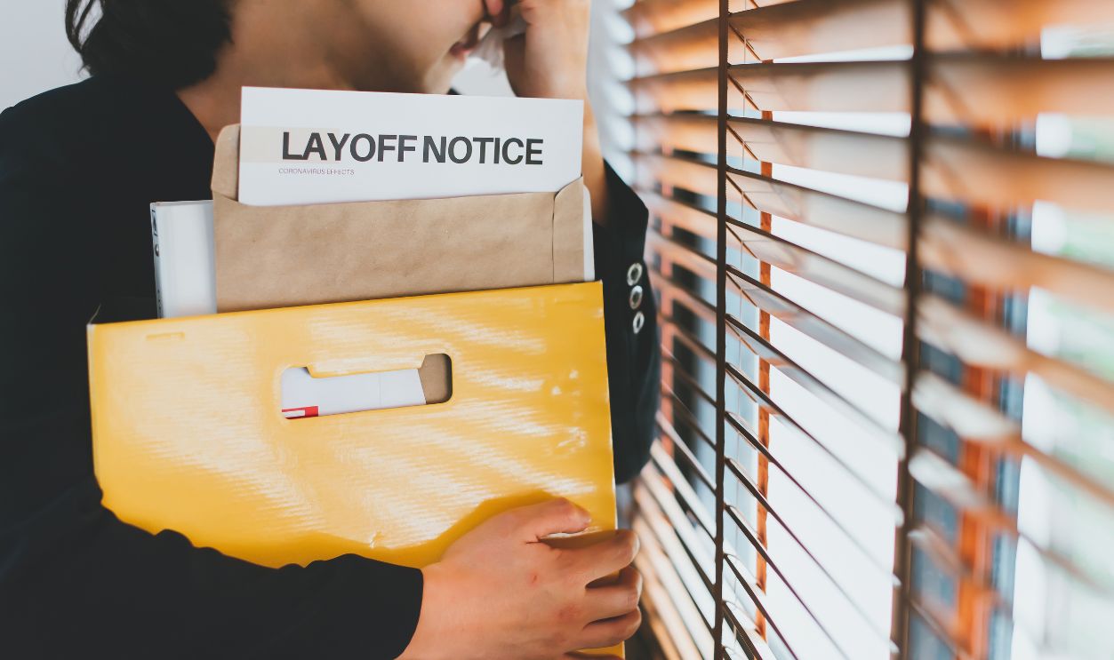 Female employee have stress and sadness after receiving a layoff notice. The impact of the economic recession during the Covid-19(corona virus) outbreak.