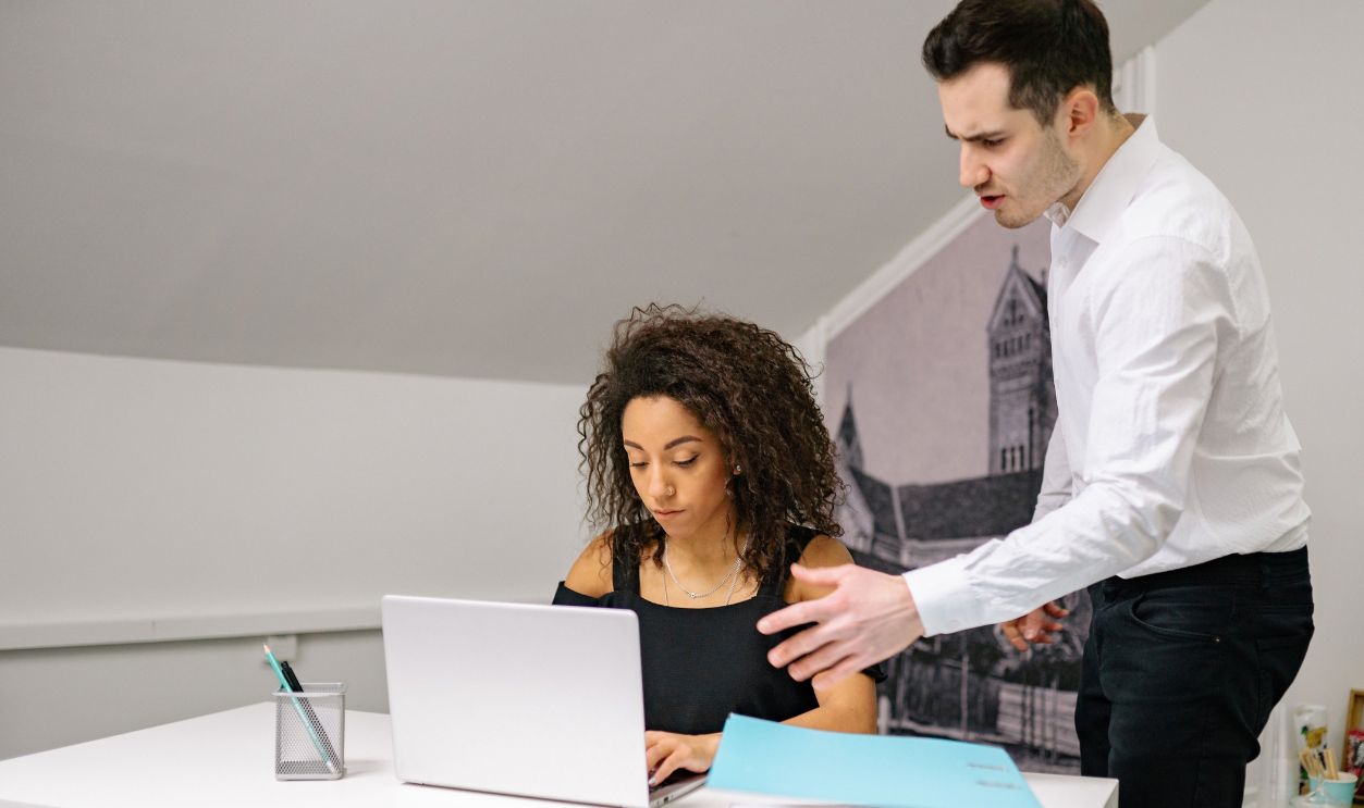 Manager and employee in discussion at the office