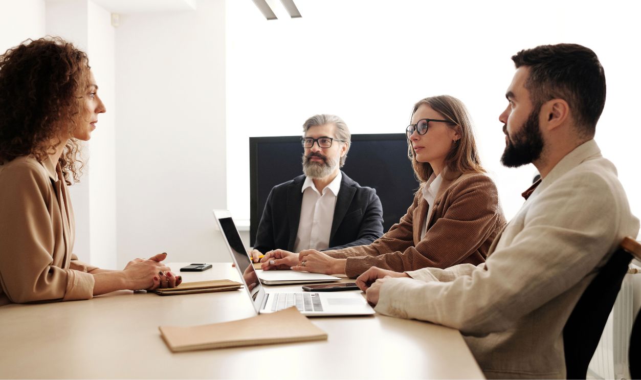 Business team meeting with diverse members collaborating