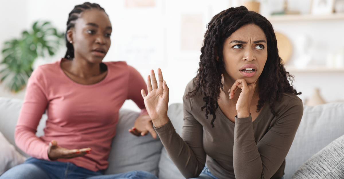 Two african american women girlfriends fighting at home