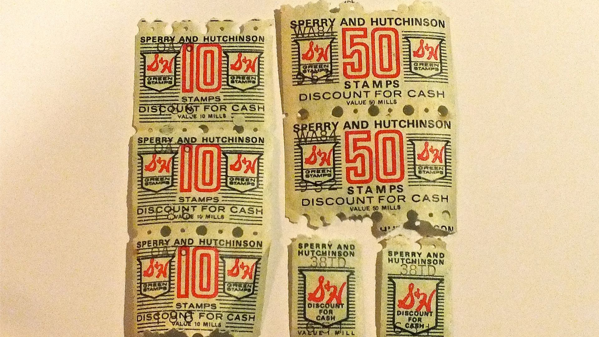 S&H Green Stamps of three different denominations and sizes
