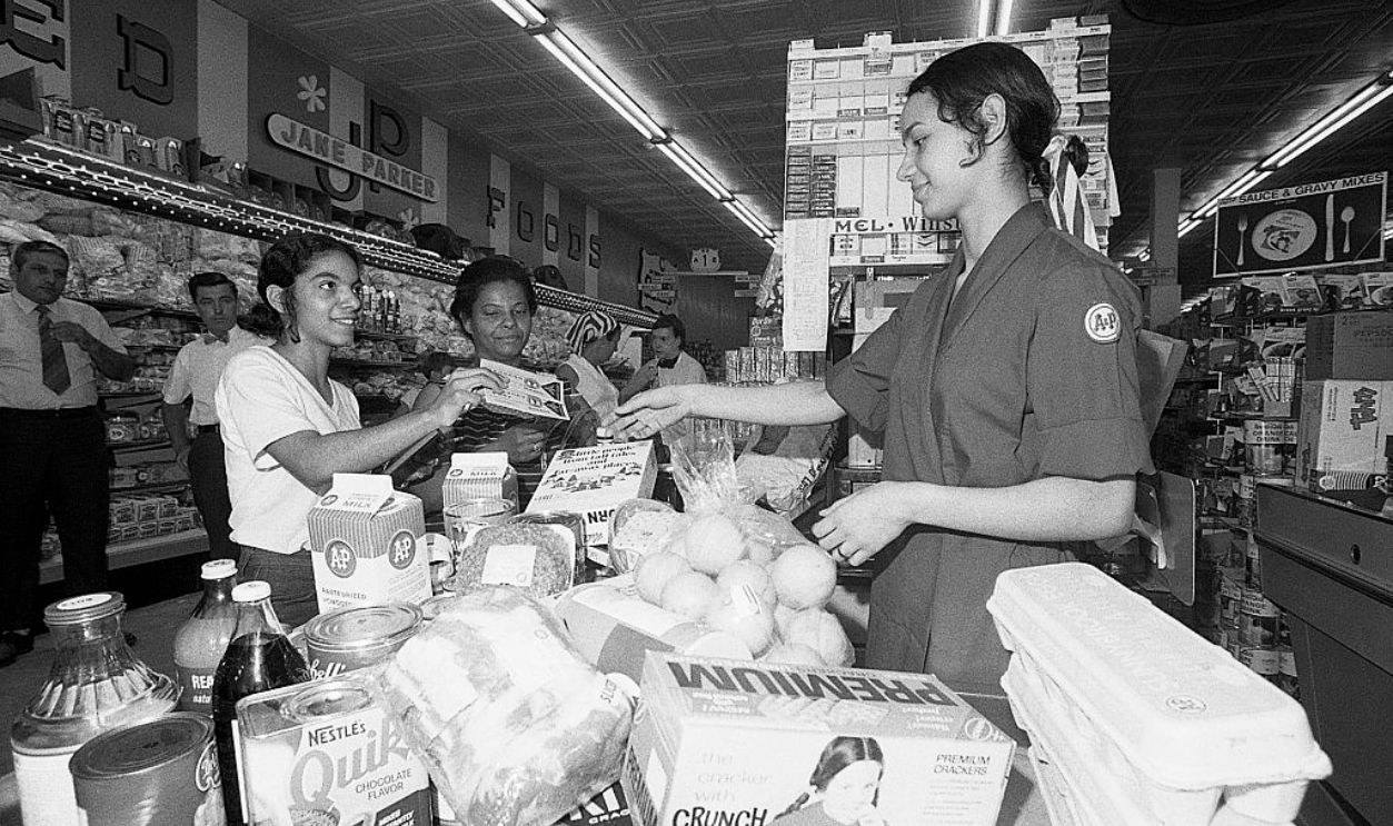 Woman Buying Groceries with Food Stamps