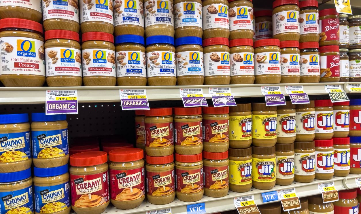 Snohomish, WA USA - circa November 2022: Wide view of a selection of peanut butter for sale inside a grocery store.