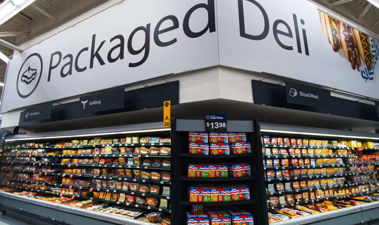Cary, North Carolina - May 15 2025: Walmart Deli Sandwich Meats Packaged Foods in Store Experience Aisles Banner Department Aisle Signage Sign Words