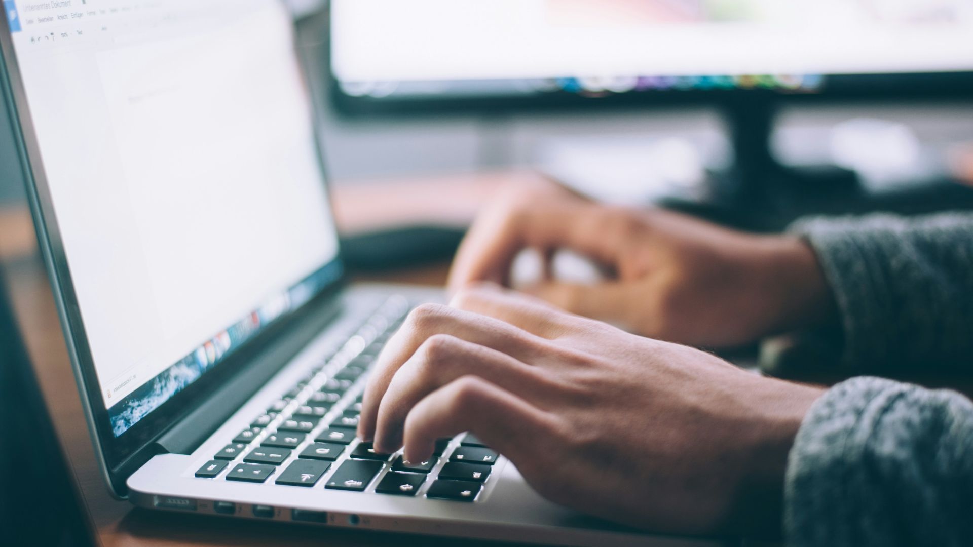 person using MacBook Pro