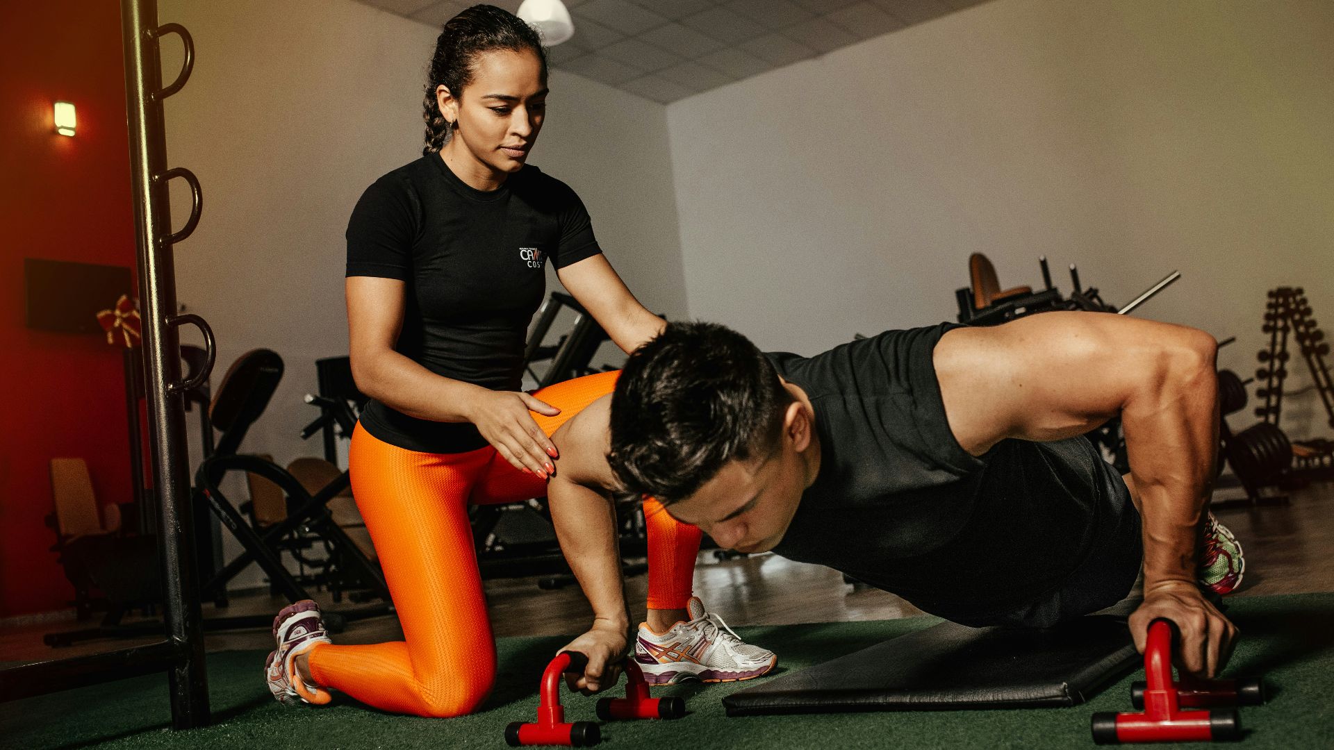 woman kneeling beside man