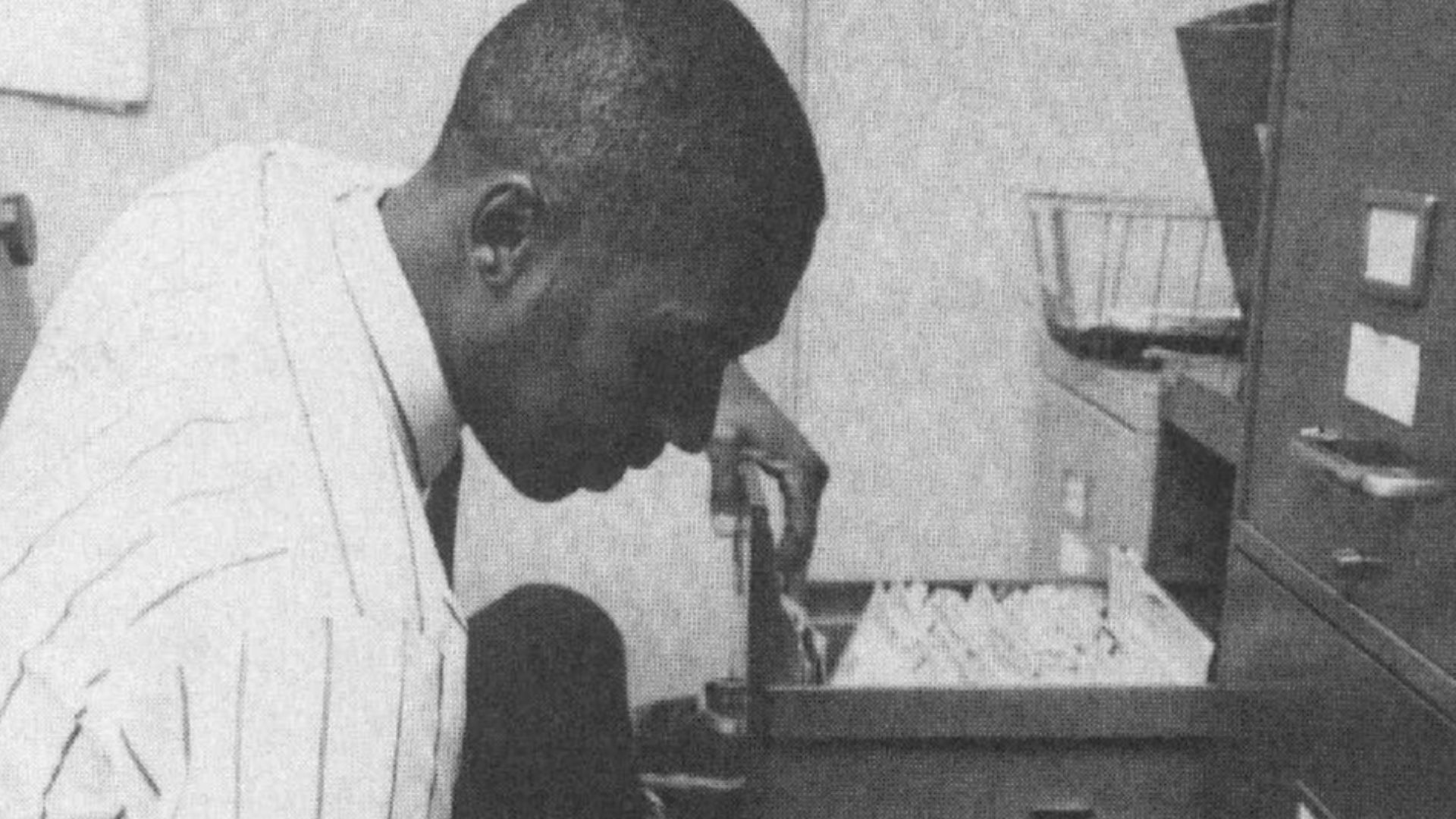 Filing clerk at work. (1992)