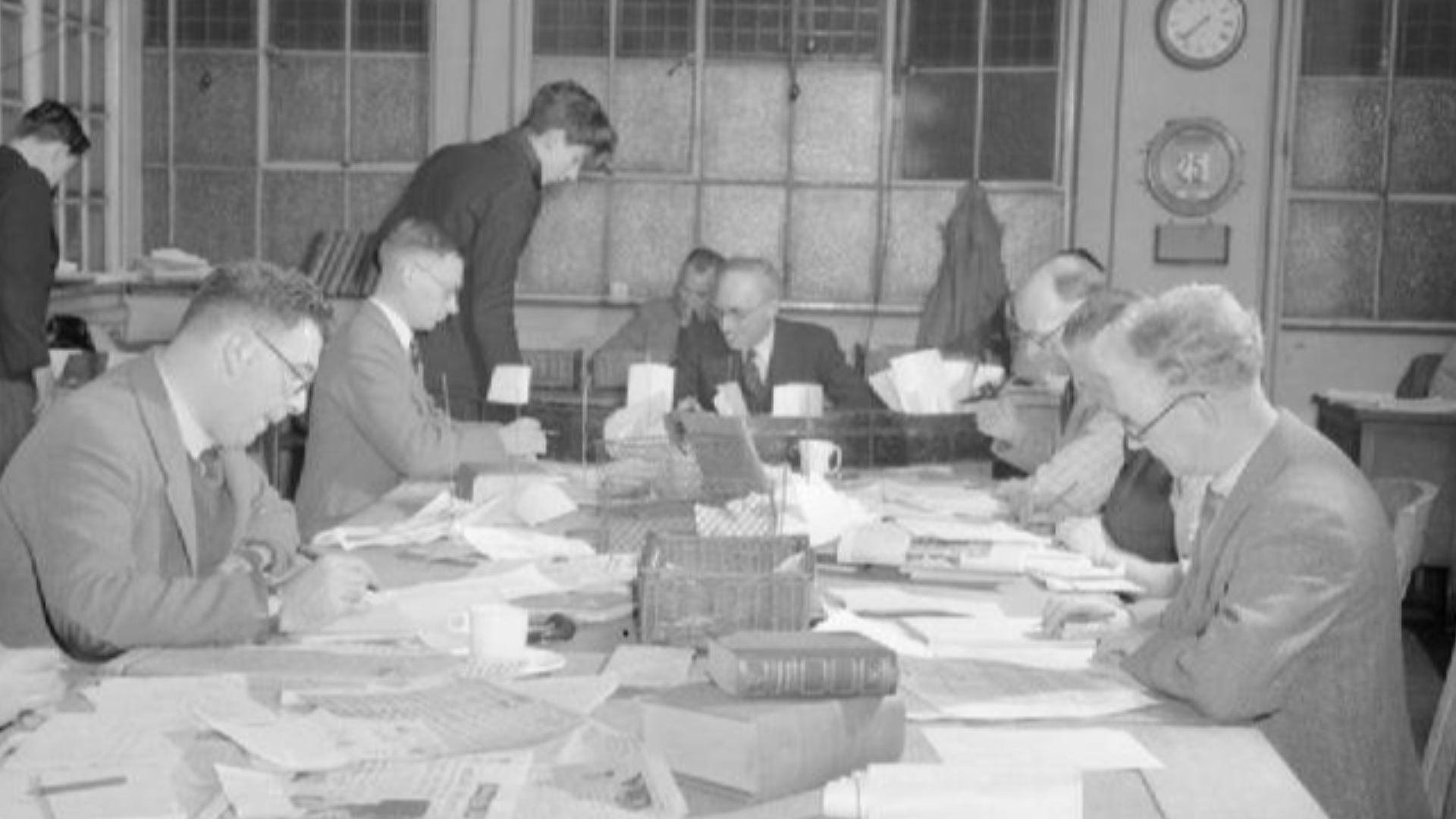 The Makings of a Modern Newspaper- the Production of 'the Daily Mail' in Wartime, London, UK, 1944
A busy scene in the sub-editor's room at the offices of the Daily Mail newspaper.  In the centre background can be seen Mr Taylor, the Copytaster, who reads