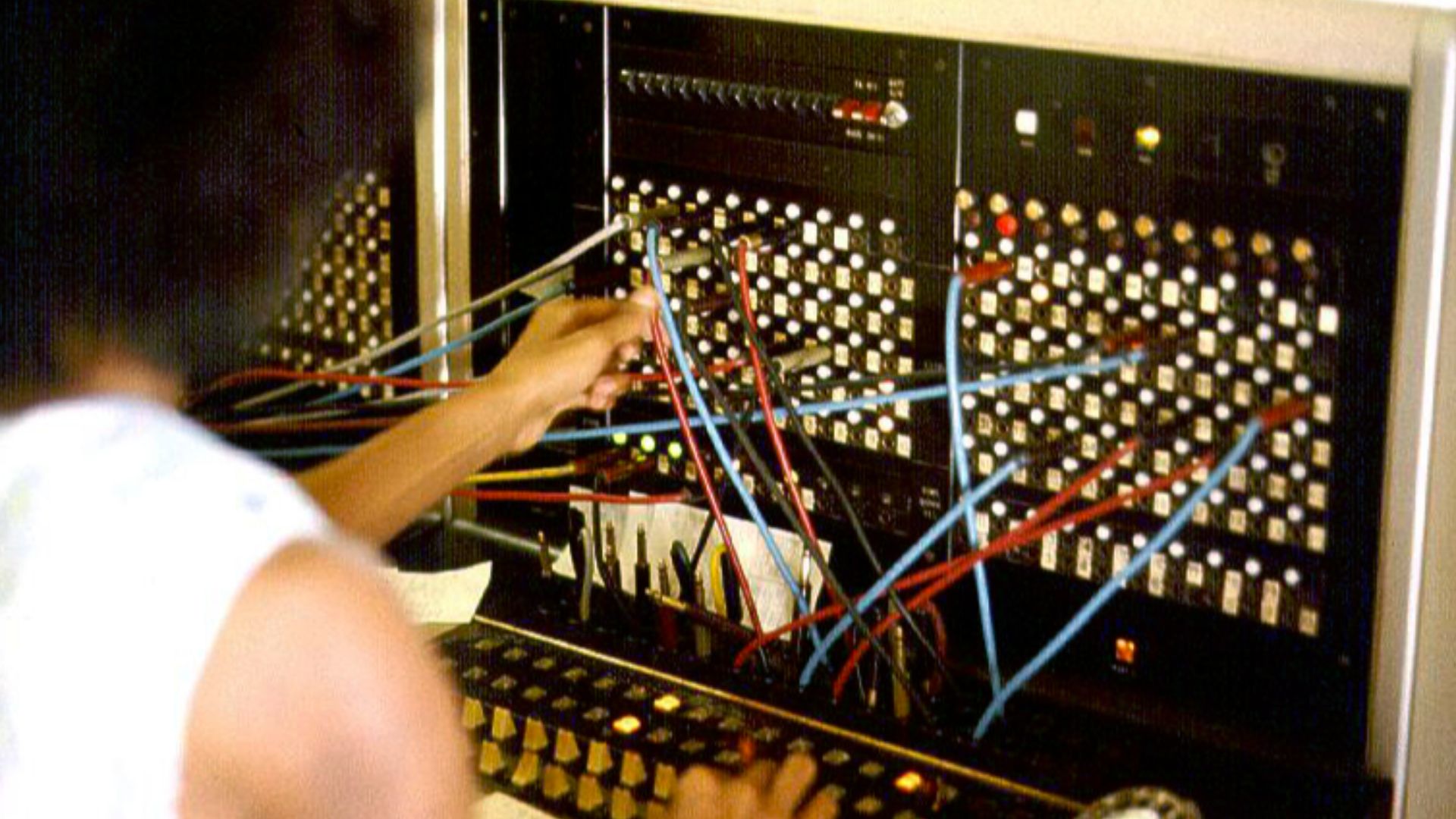 Jersey Telecom telephone operator at switchboard, 1975