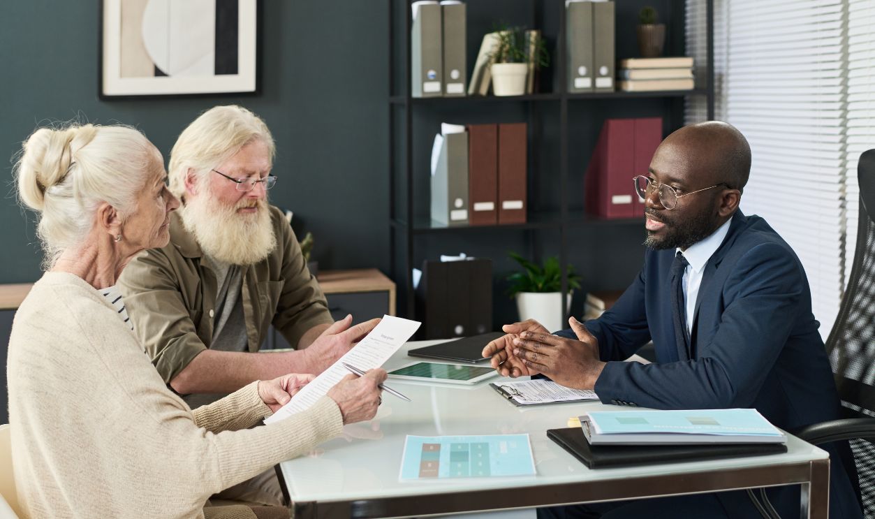 2612754183 - Senior Couple Having Meeting With Real Estate Agent