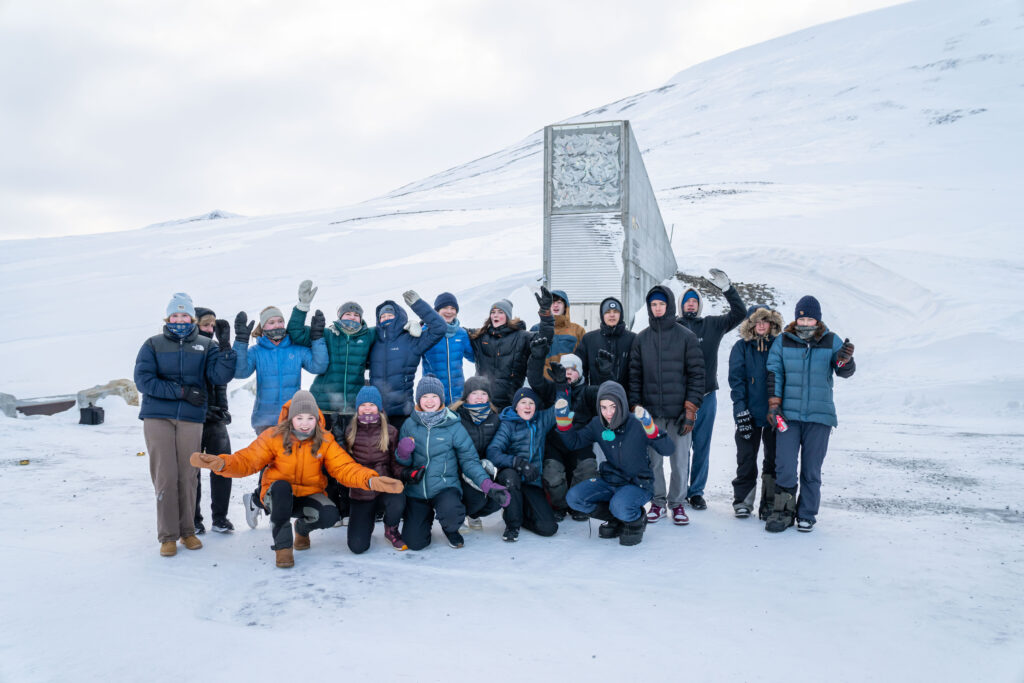 People standing in front of the global seed vault
