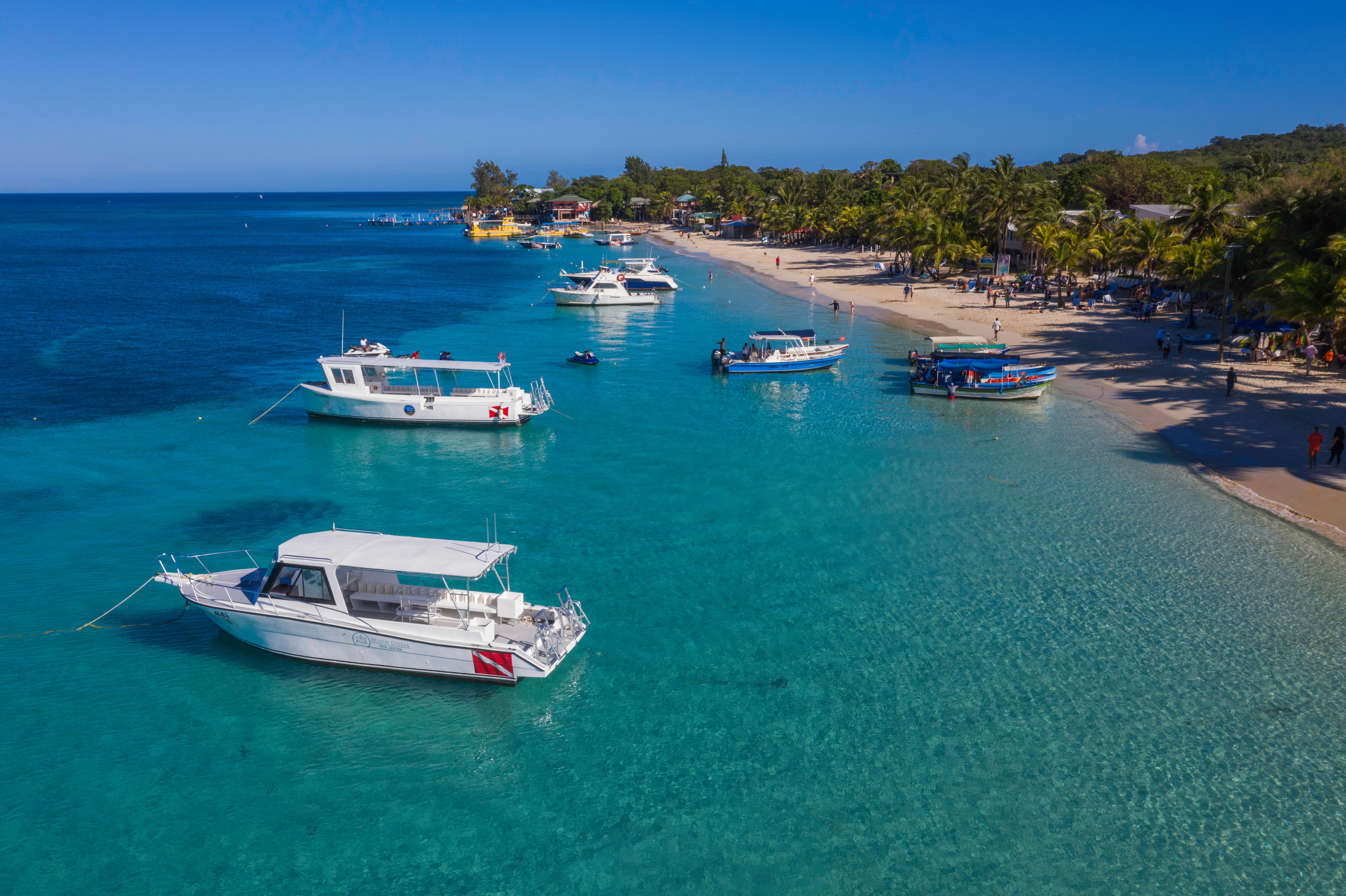 Boats on tropical beach in Honduras