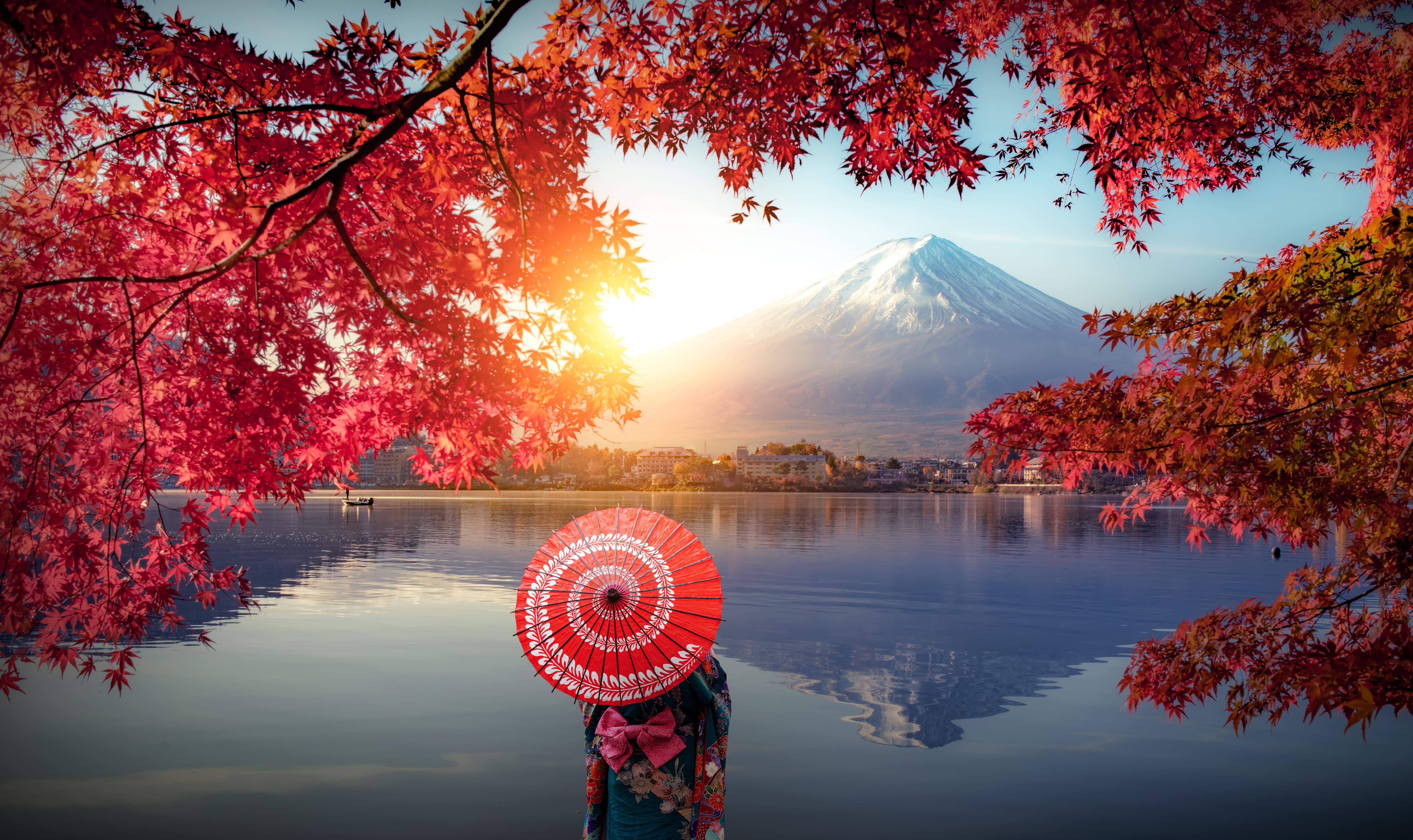 Person standing overlooking the water at Mt. Fuji, Japan