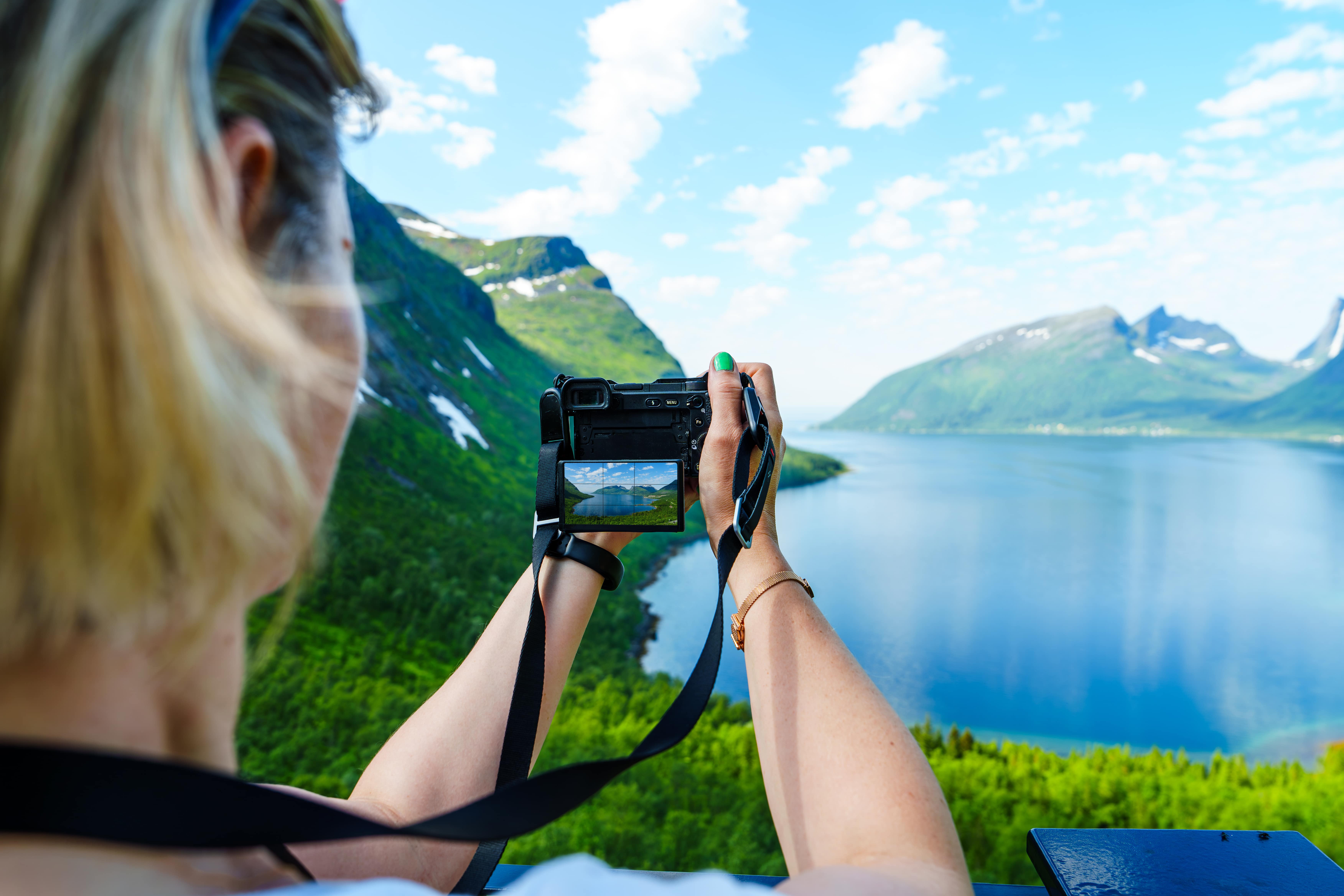 A photographer in The Fjords, Norway