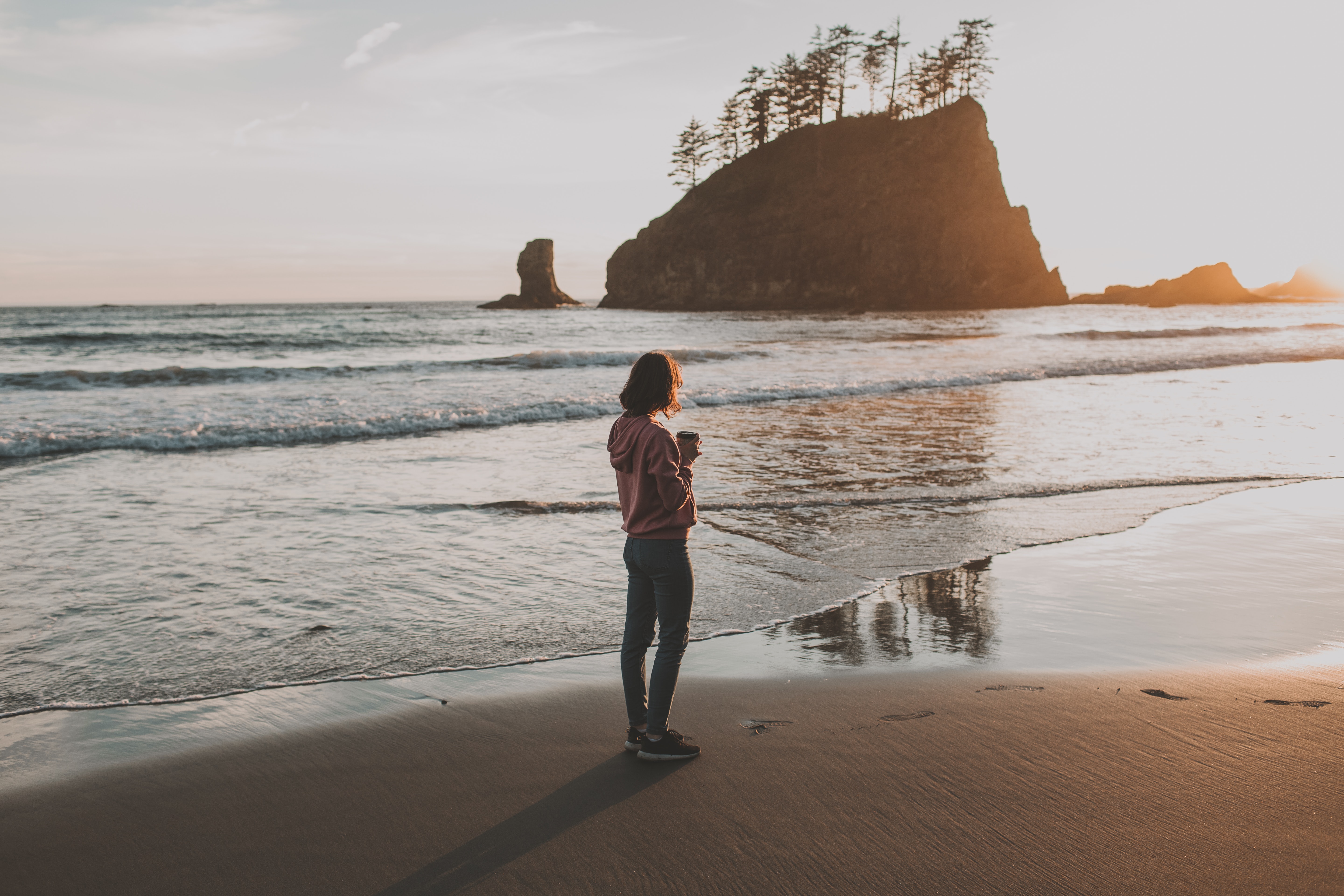 A woman walking on the beach