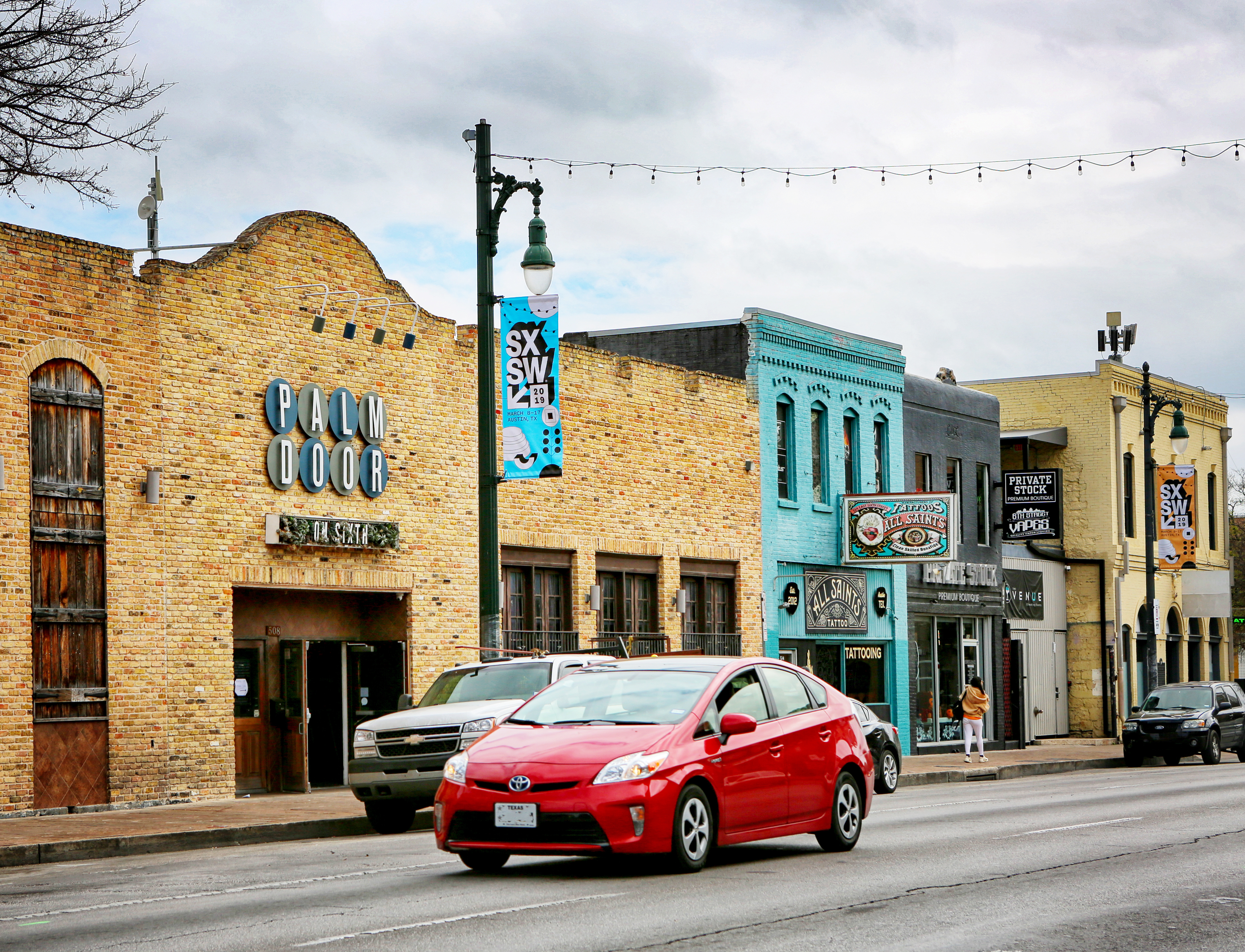 Red car on 6th street in austin texas