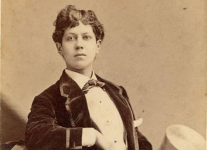 Grayscale photo of Ella Wesner, Gilded Age male impersonator