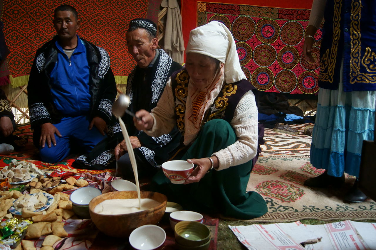 Kazakh Woman Serving Tea - 2011