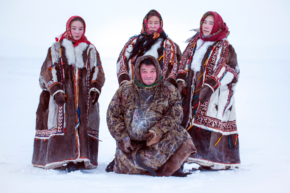 Nenets family in the national winter clothes