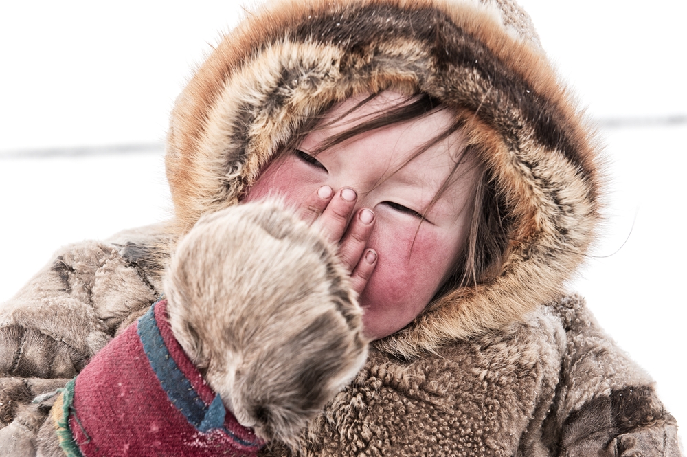 A Nenets child in the national fur clothes