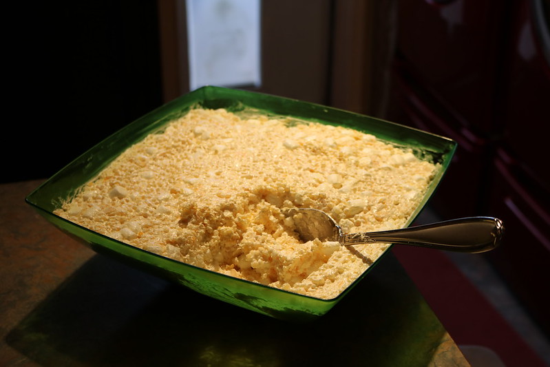 Close-up Photo of a Frogeye Salad in a green glass bowl