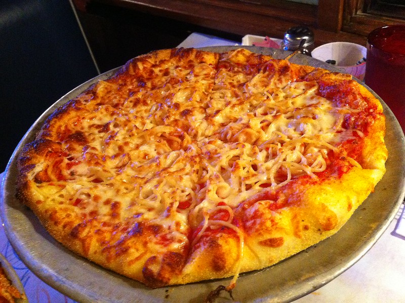Close-up photo oh Spaghetti Pizza placed on a table