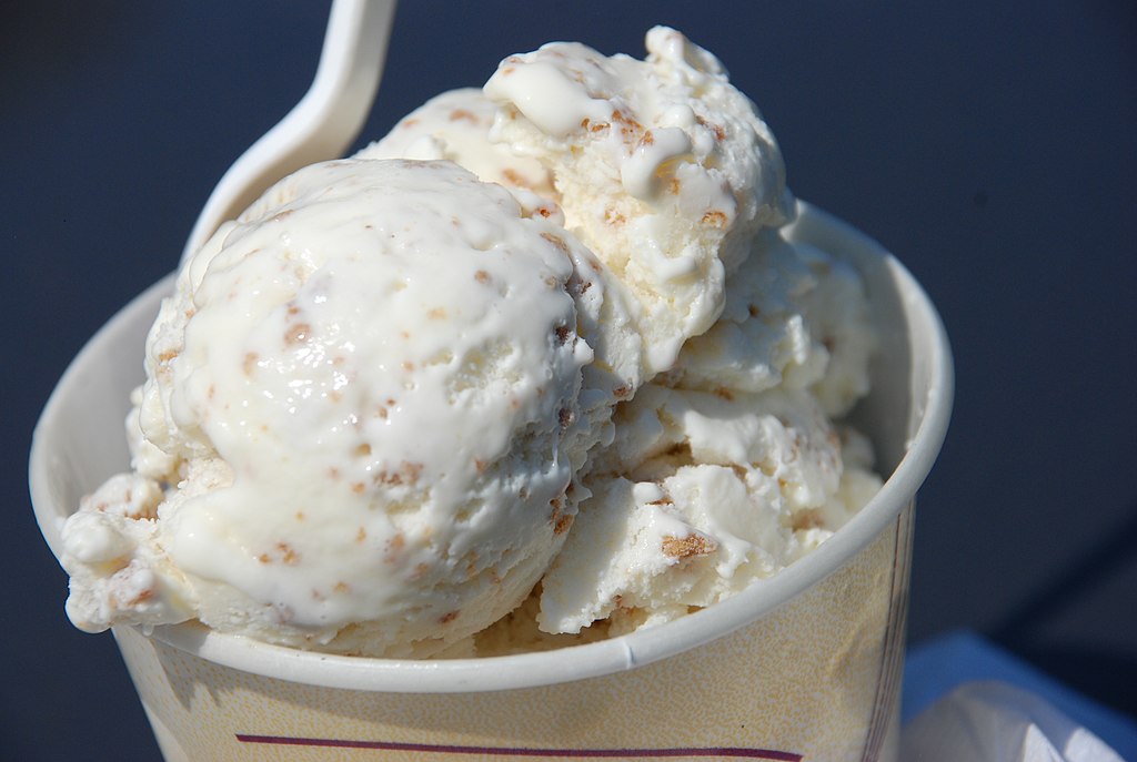Close up photo of grape nut ice cream in a cup